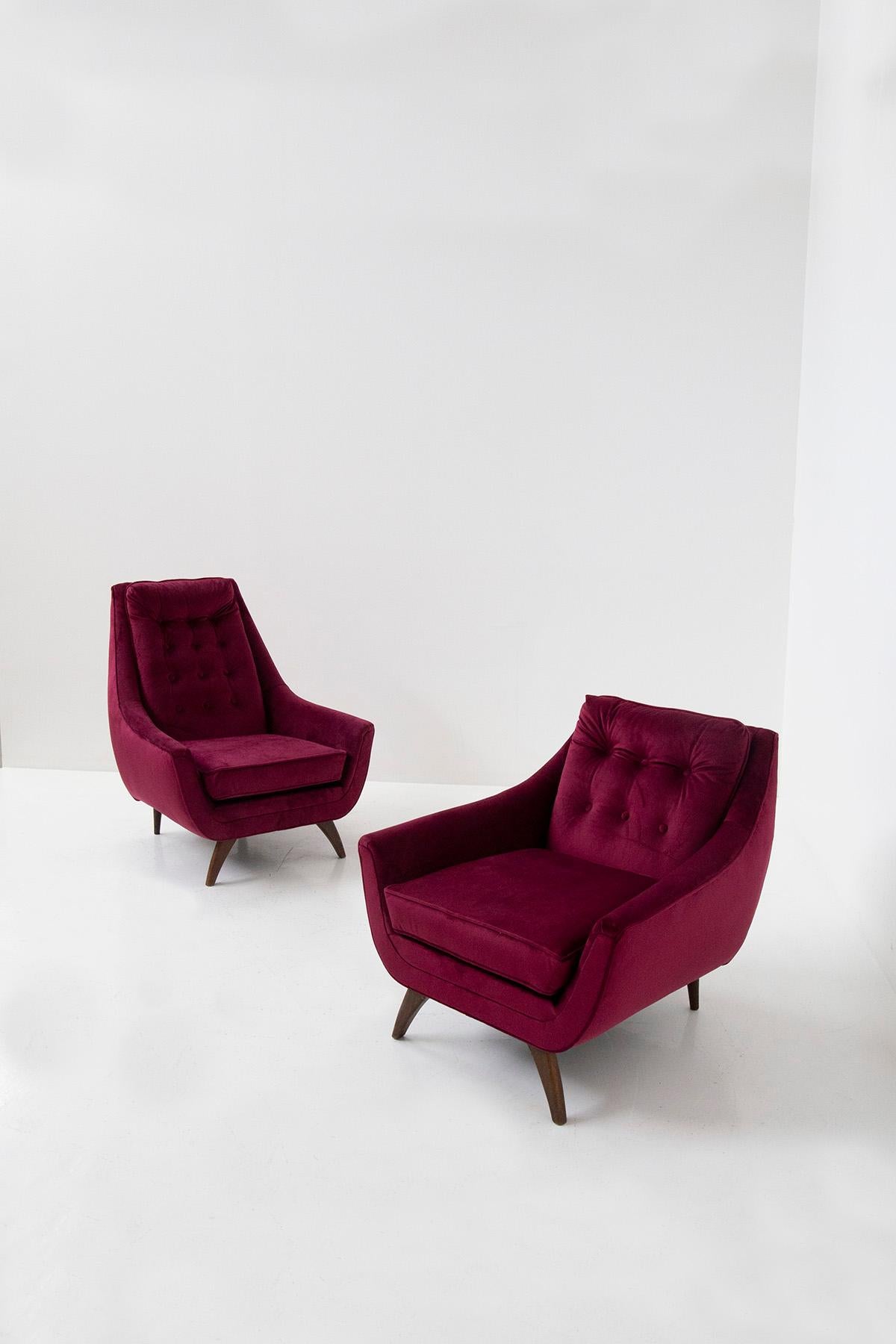 Elegant pair of armchairs by Adrian Pearsall from the 1950s. The pair is part of a duet called: Him and Her, in fact the different sizes of the pair are denoted. The taller armchair in the 1950s was intended for the man, while the lower one for the