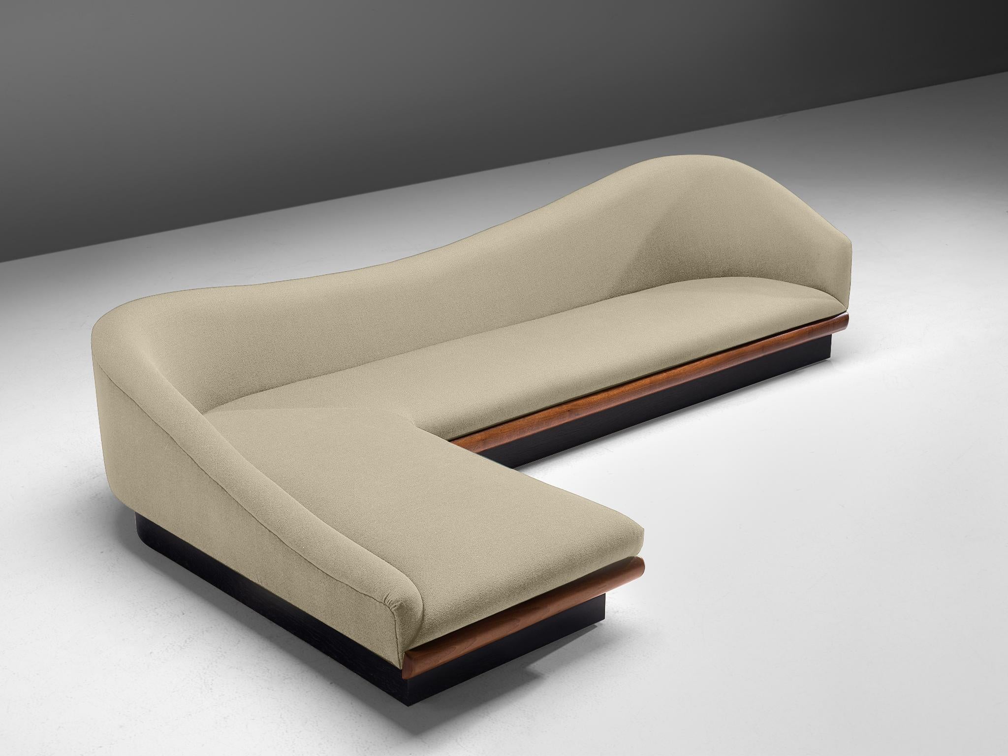 Adrian Pearsall, 'Cloud' sofa, walnut, upholstery, United States, 1950s

This cloud sofa has a modern shape, and sinuous lines which create a comfortable and appealing look. The L-shaped sofa is a great addition to a living area or dining area,