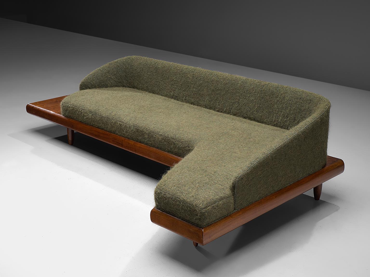 Adrian Pearsall, 'Boomerang' sofa, in green Pierre Frey fabric and walnut, United States, 1960s

This boomerang sofa has a unique shape with sinuous lines which create a monumental and inviting look. The backrest holds sloping armrests and a high,