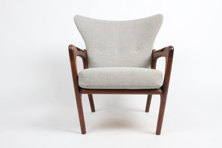 Beautifully restored Mid-Century Modern Danish style Adrain Pearsall Wingback Sculptural lounge chair by Craft Associates. Walnut frame restored original finish, reupholstered in a grey tweed, with new foam. Retains Craft Associates fabric tag.