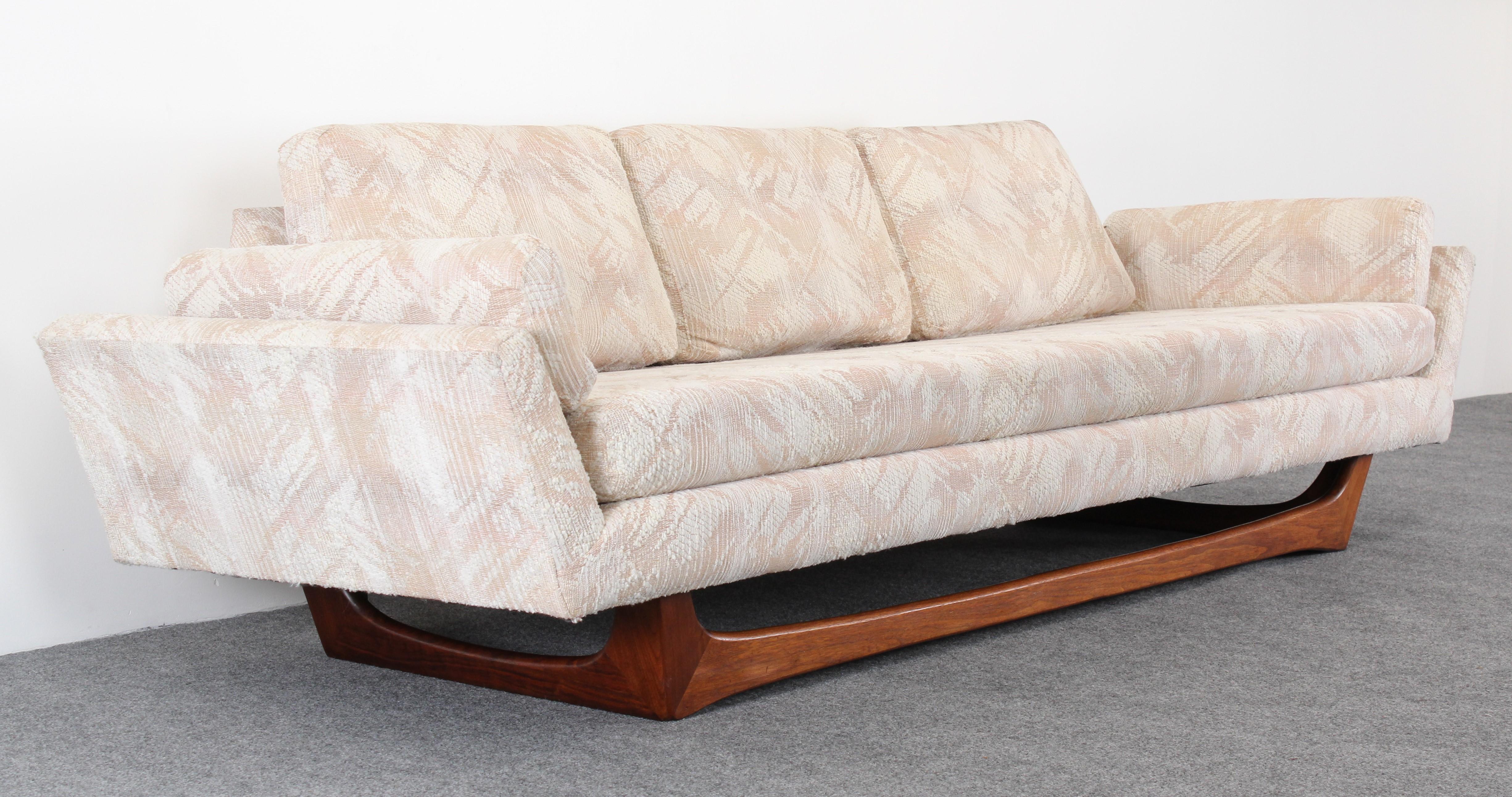 An unusual rare model Mid-Century Modern Adrian Pearsall sofa for Craft Associates, Inc., 1960s. This sofa has simplistic modern lines and a sculptural walnut base. New upholstery recommended. 

Dimensions: 29