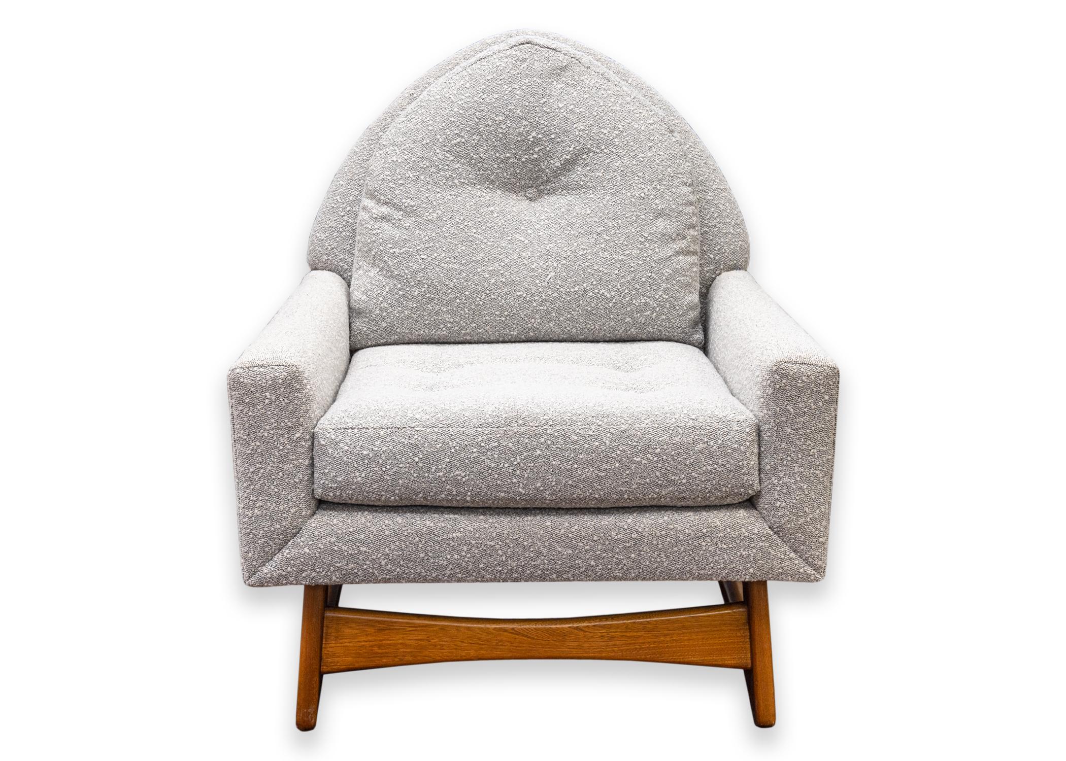 An Adrian Pearsall style Kroehler accent chair. A beautiful accent piece with a super cozy reupholstered grey fabric, removable seat cushion, and a curved walnut wood base frame. Both the seat cushion and the back have a lovely tufted design. This