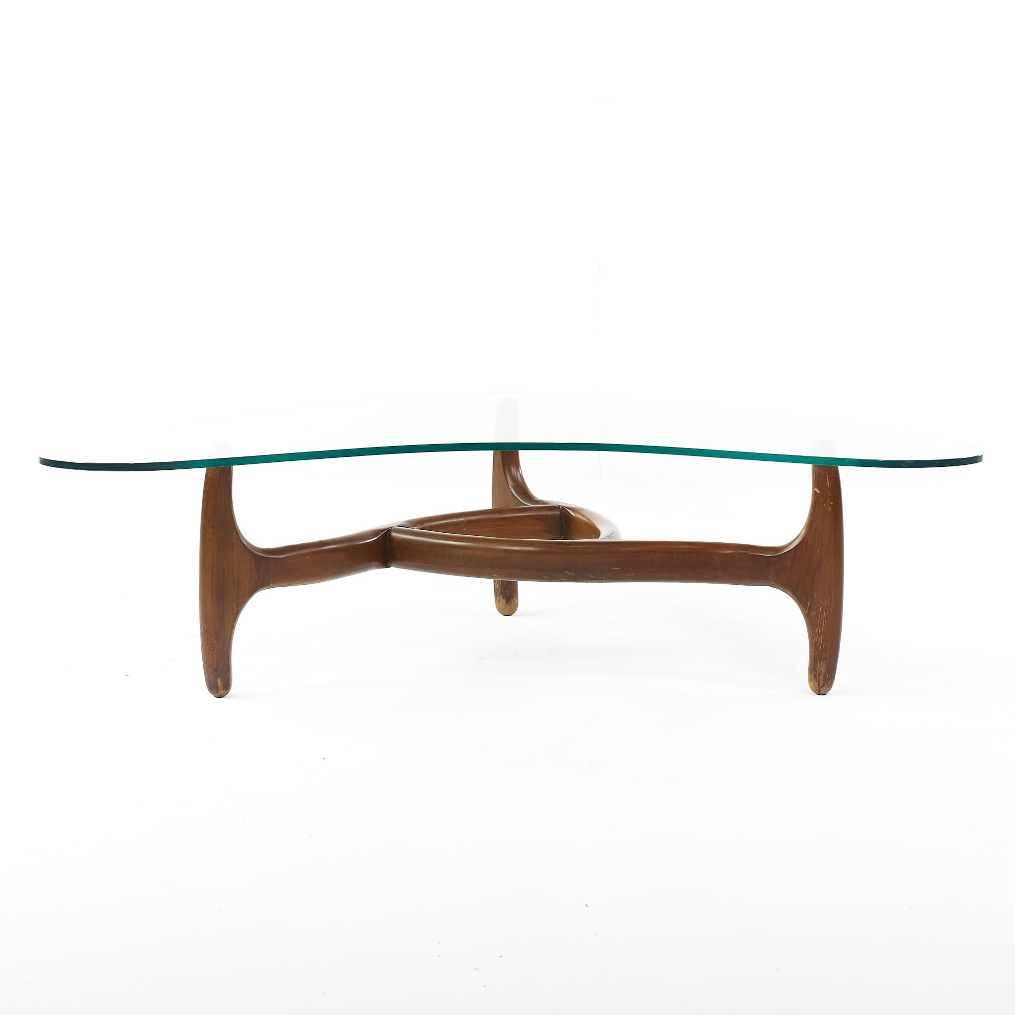 Adrian Pearsall style mid century Tong coffee table

This table measures: 52 wide x 38 deep x 15 inches high

All pieces of furniture can be had in what we call restored vintage condition. That means the piece is restored upon purchase so it’s