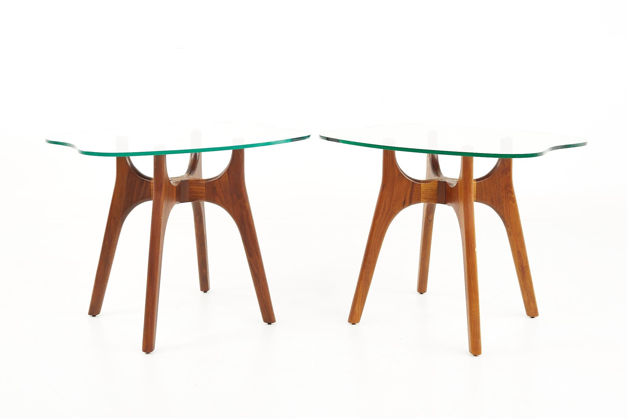 Adrian Pearsall style mid century walnut and glass stingray end tables - a pair

Each table measures: 25.25 wide x 21.5 deep x 20 inches high

All pieces of furniture can be had in what we call restored vintage condition. That means the piece is