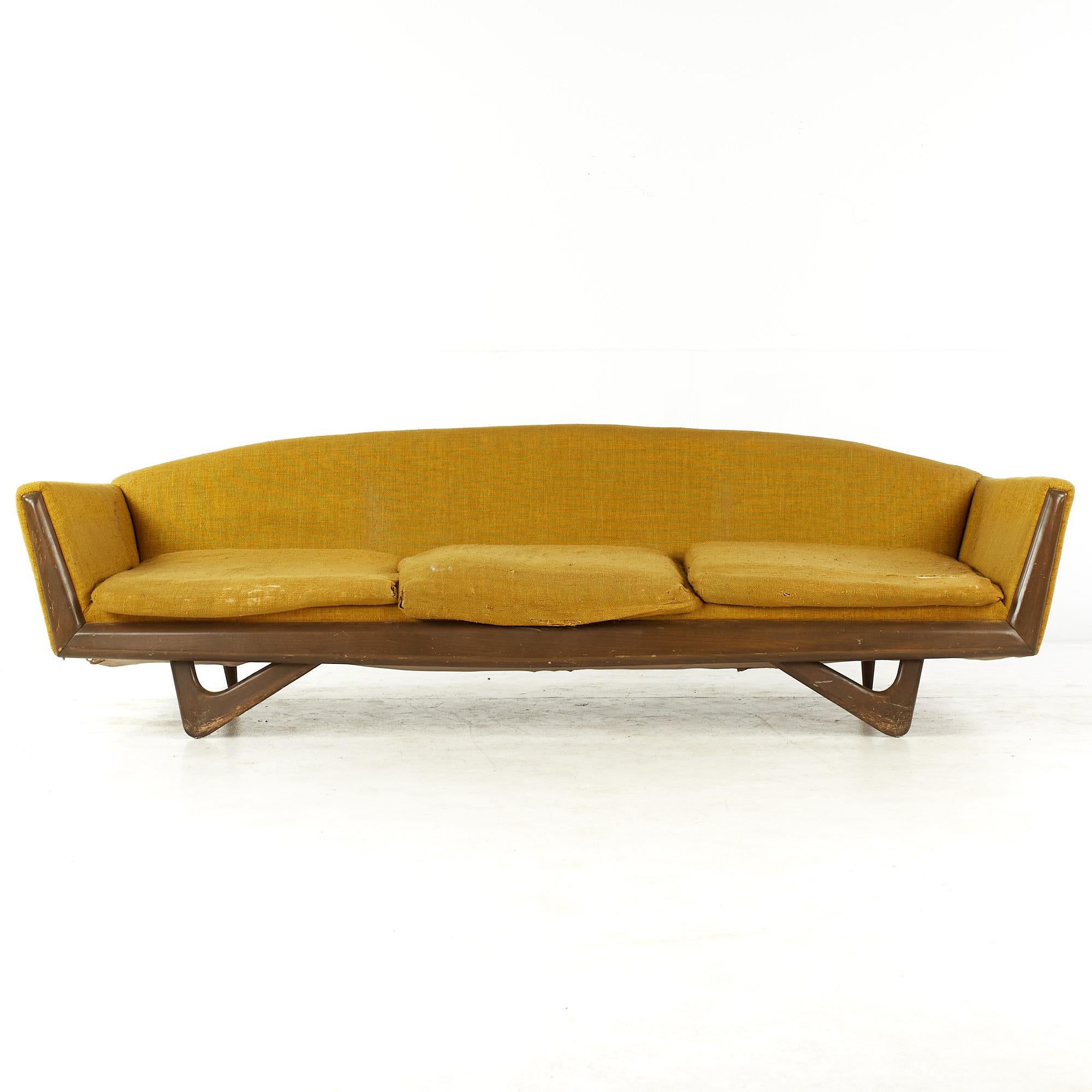 Adrian Pearsall Style Mid Century walnut Gondola sofa

This sofa measures: 93 wide x 34 deep x 27.5 inches high, with a seat height of 15 and arm height of 22.5 inches

All pieces of furniture can be had in what we call restored vintage