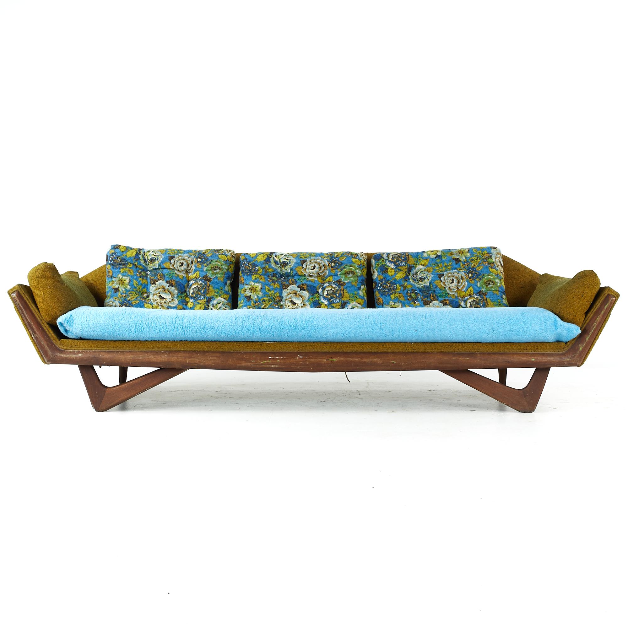 Adrian Pearsall Style midcentury walnut gondola sofa

This sofa measures: 101 wide x 33 deep x 27 inches high, with a seat height of 17 and arm height of 21.5 inches

All pieces of furniture can be had in what we call restored vintage condition.