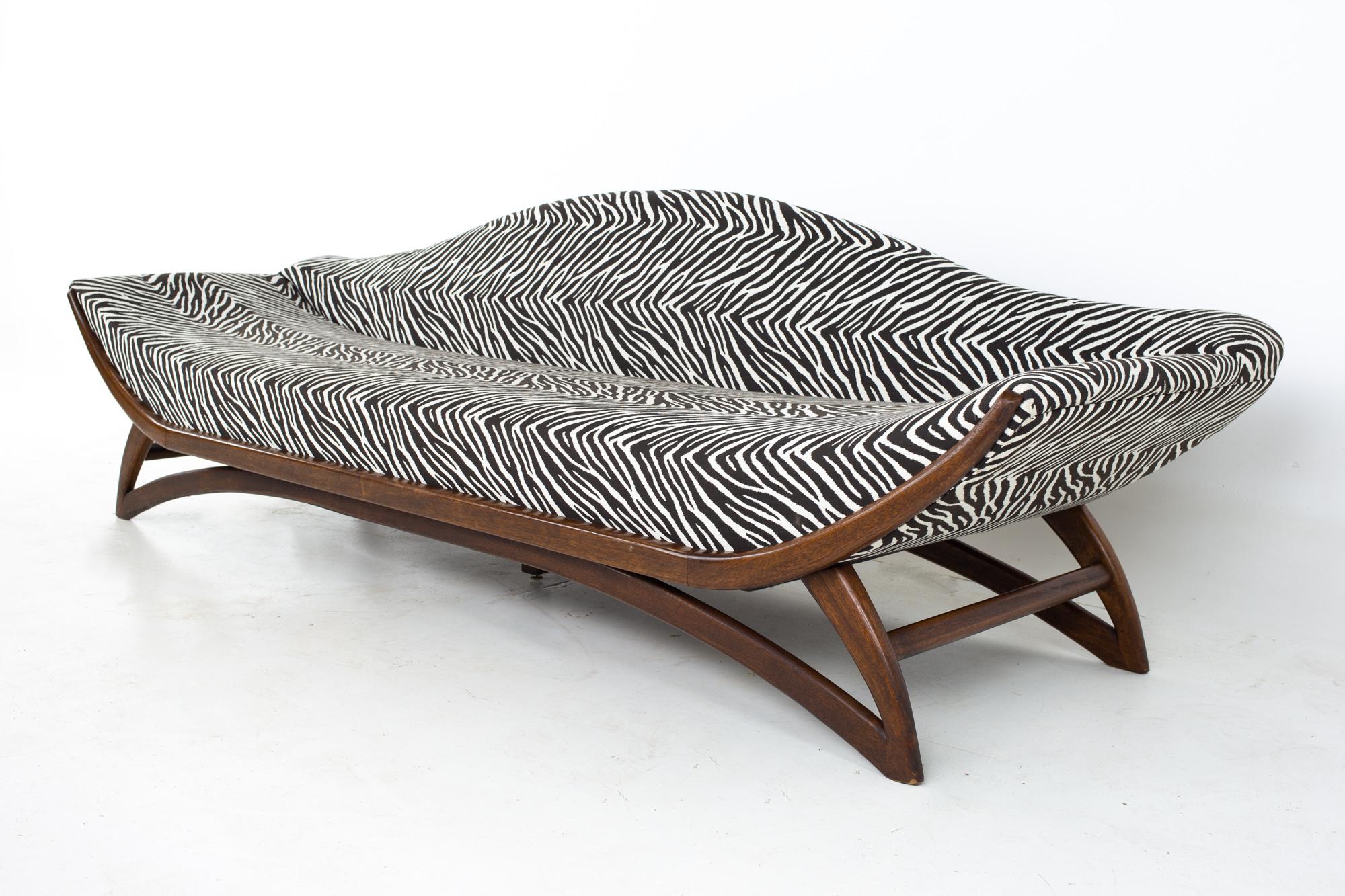 Adrian Pearsall style Mid Century zebra stripe gondola sofa
Sofa measures: 106.5 wide x 33 deep x 32.5 high, with a seat height of 17.5 inches and an arm height of 23.5 inches

All pieces of furniture can be had in what we call restored vintage