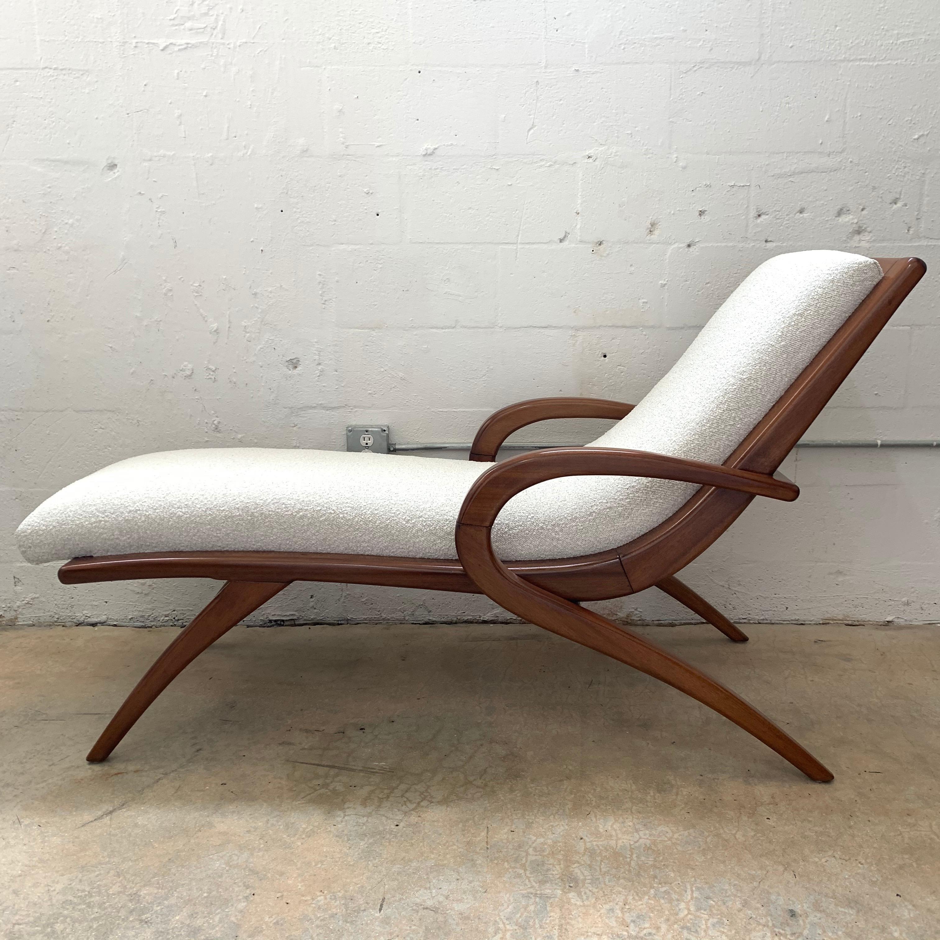 Sculptural midcentury chaise wave lounge rendered in a polished walnut frame with boucle upholstery, designed by Adrian Pearsall, USA, 1960s.

Style of Vladimir Kagan.