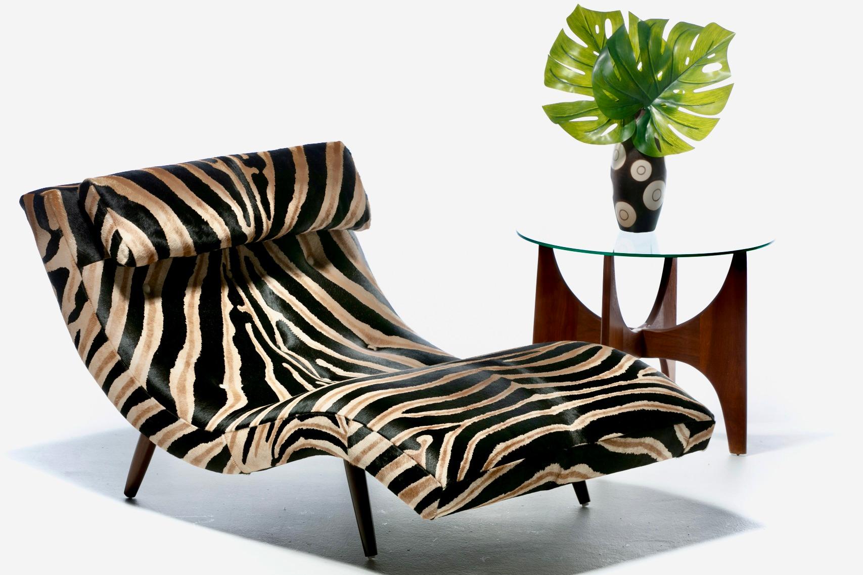 One look and you'll be hooked on this drop dead gorgeous Mid-Century Modern wave chaise by none other than famed designer Adrian Pearsall freshly reupholstered in rich zebra stamped cowhides. Without a doubt, Adrian Pearsall is the master of the mid