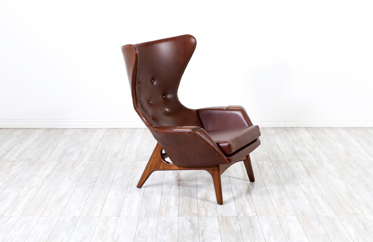 Adrian Pearsall wing back cognac leather lounge chair.