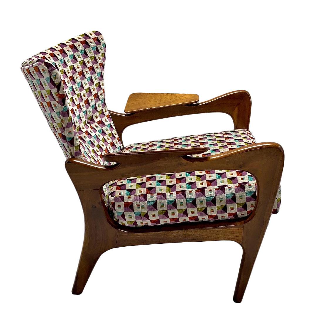 Adrian Pearsall wingback lounge chair model 2291-C for Craft Associates, circa 1960s. This relatively rare wingback chair is distinguished by its sculptural walnut wood frame in organic shapes and well-proportioned profile. Chair is clearly marked
