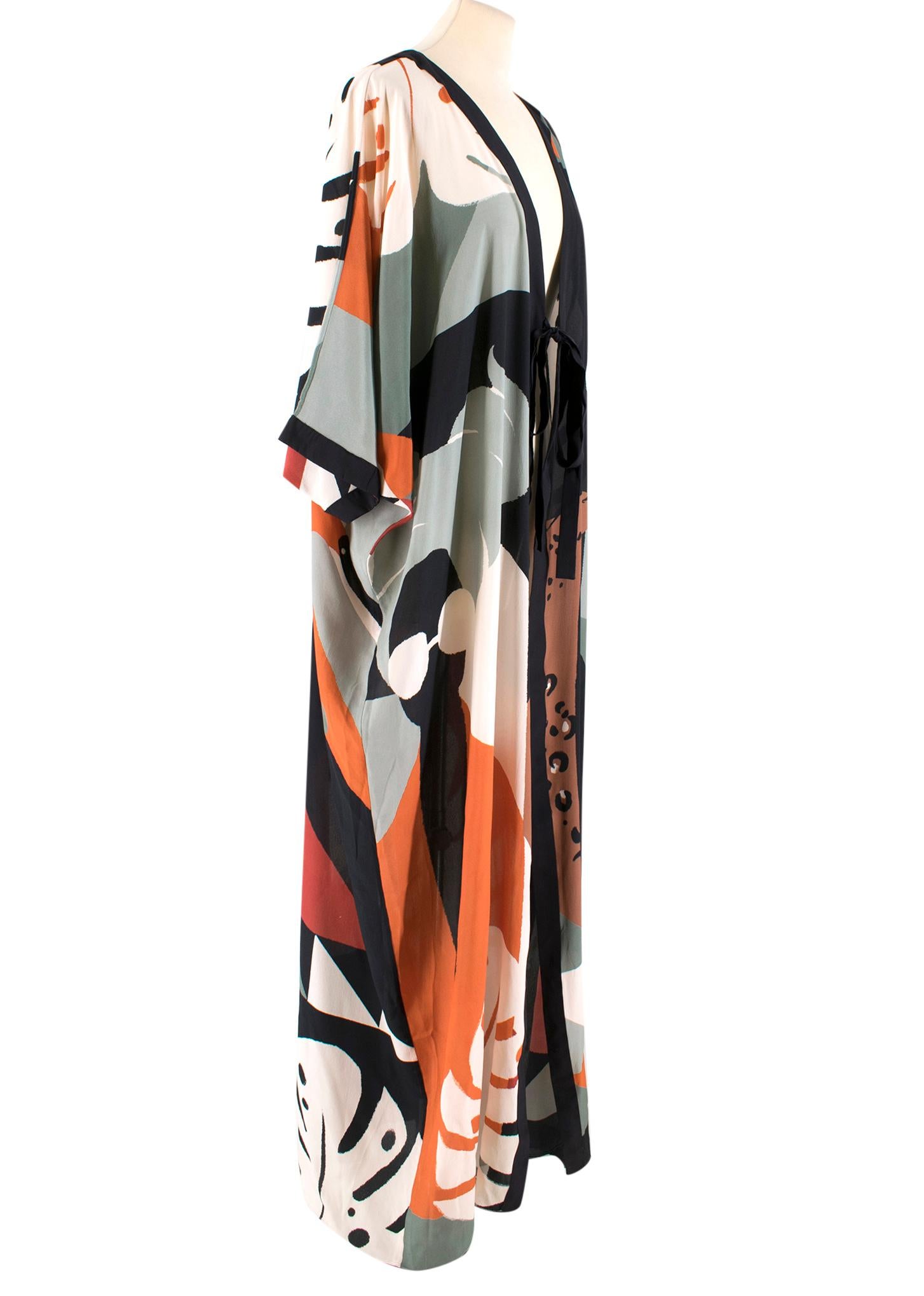 Adriana Degreas Multi-Print Silk Beach Tie Front Cover-up

-Multicolored, silk
-Animal pattern design
-Wrap styled
-Two silk strap closure

Please note, these items are pre-owned and may show some signs of storage, even when unworn and unused. This