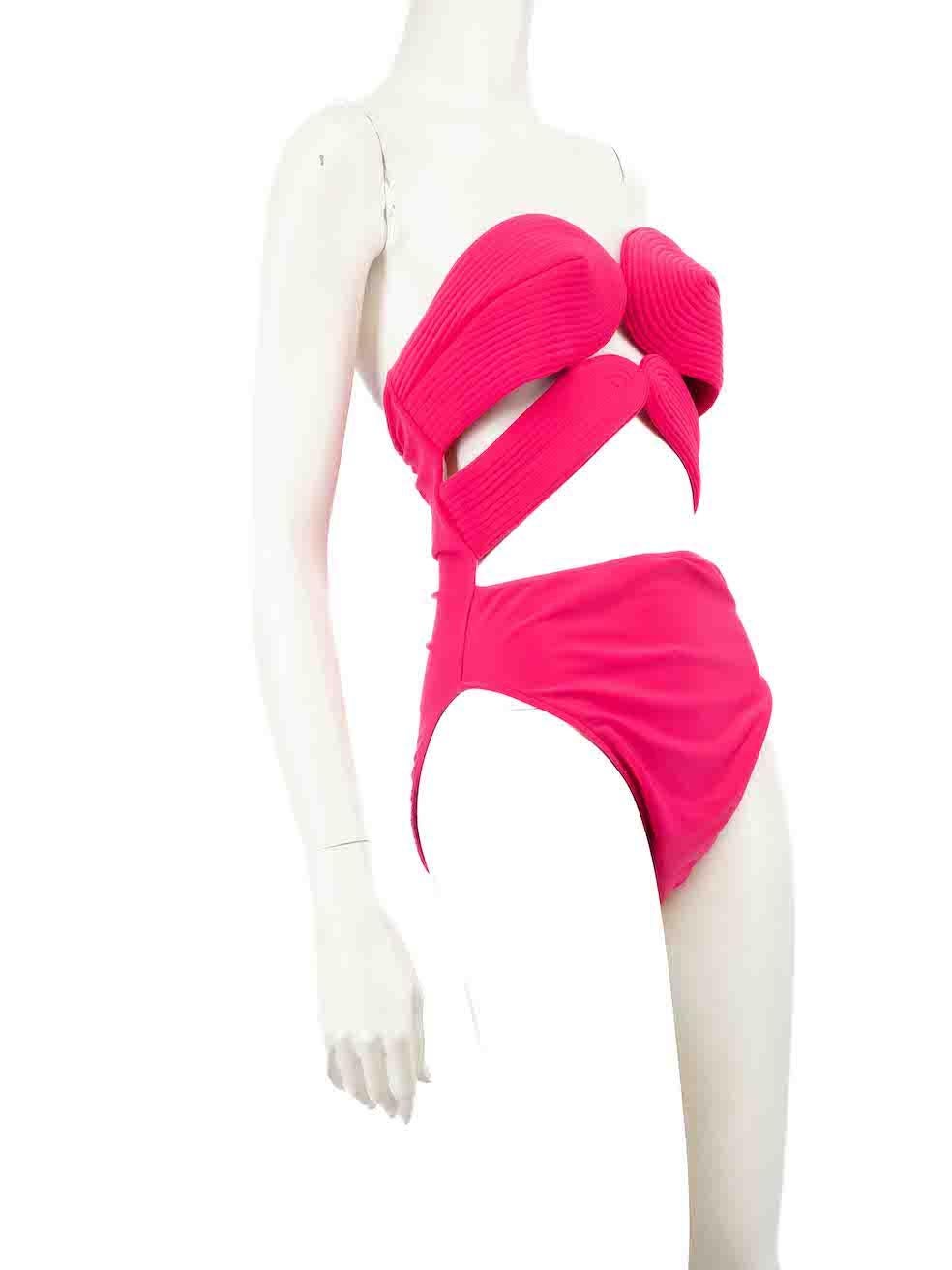 CONDITION is Never worn, with tags. No visible wear to swimsuit is evident. However due to poor storage, the front left side and lining has small pull to weave. A tiny white mark is seen on the centre front of this new Adriana Degreas designer