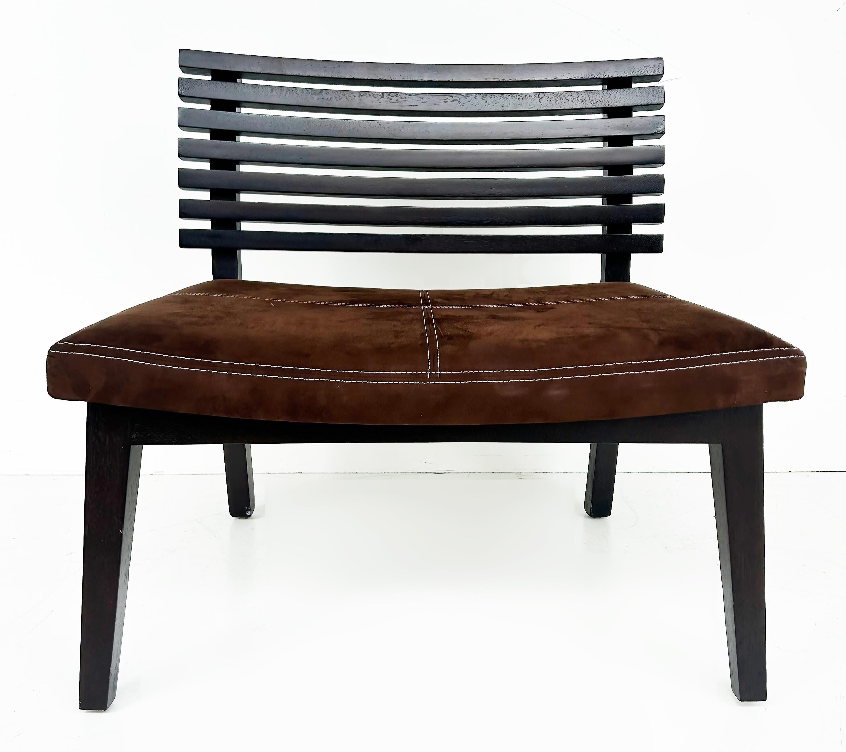 Adriana Hoyos Suede Slatted Wood  Slipper Chairs with Suede Seat Cushions, Pair

Offered for sale is a pair of elegant vintage Adriana Hoyos slatted wood slipper chairs with suede saddle-stitched seats. The chairs were photographed with small