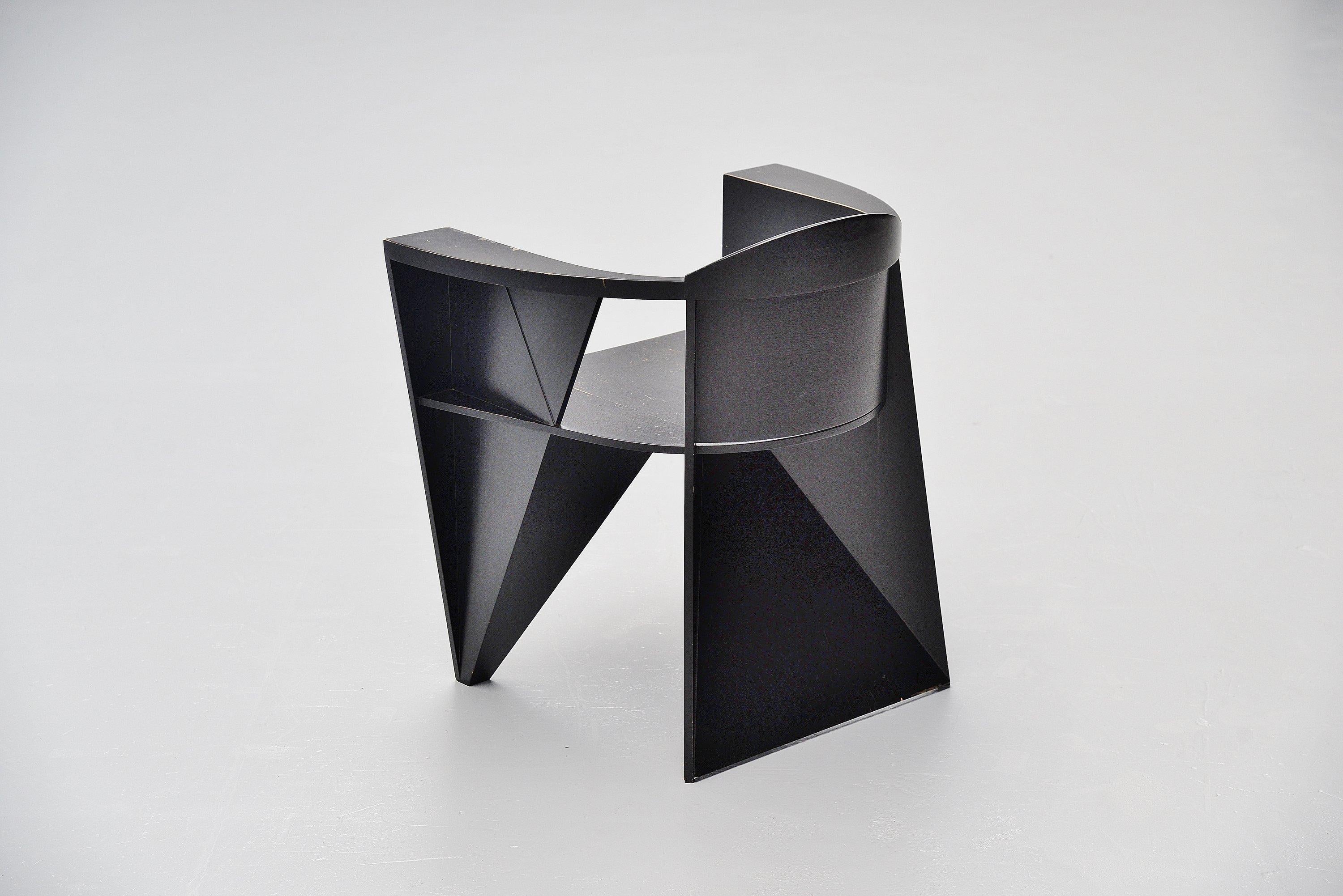 Fantastic constructivistic shaped Postmodern armchair designed by designer duo Adriano e Paolo Suman, manufactured by Giorgetti Spa, Italy, 1984. This chair is from the Matrix series designed in 1984. Very nice constructivist chair made of beech