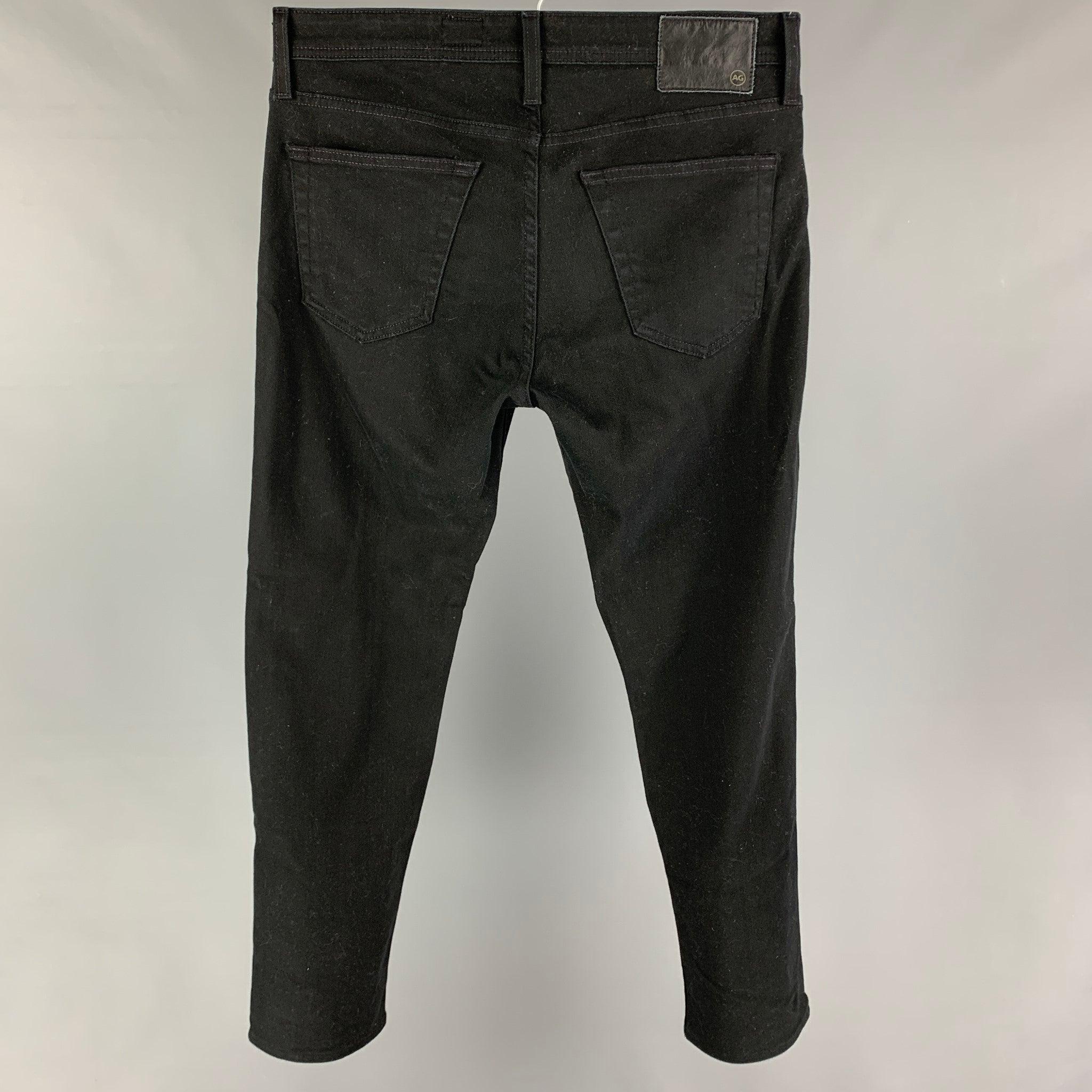 ADRIANO GOLDSCHMIED jeans comes in a black cotton / polyurethane featuring a slim-fit and a zip fly closure.
 Excellent
 Pre-Owned Condition. 
 

 Marked:  32x32 
 

 Measurements: 
  Waist: 34 inches Rise: 10 inches Inseam: 30 inches Leg Opening: