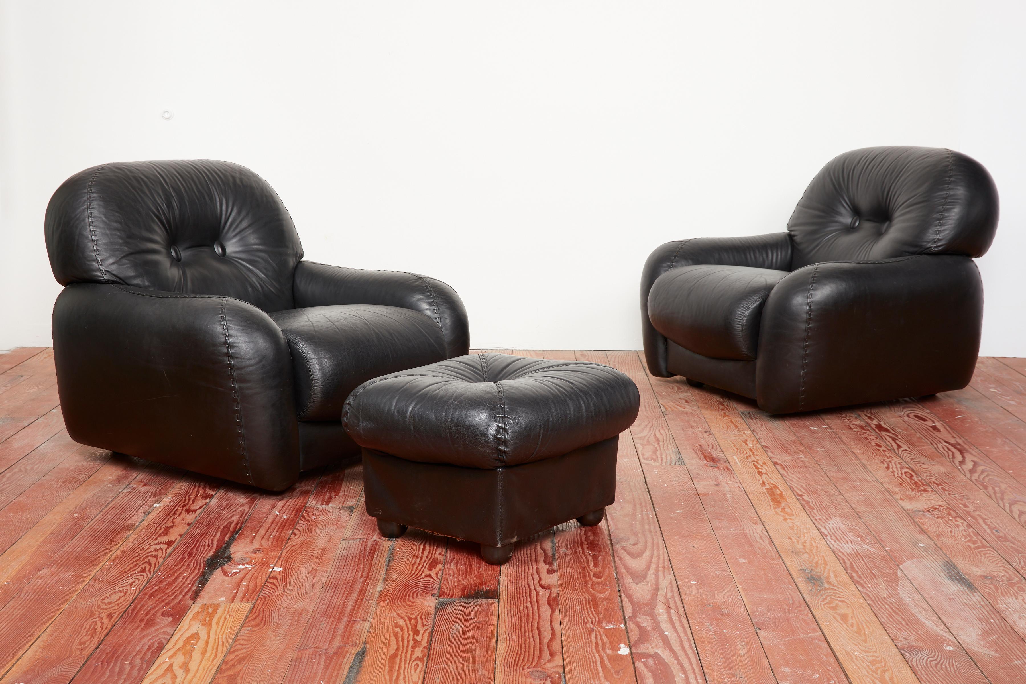 Italian leather club chairs by Adriano Piazzesi, circa 1960s. 
Great original soft black leather with signature baseball stitching detail. 

Part of a set with matching settee available. 

Perfect for a media room!