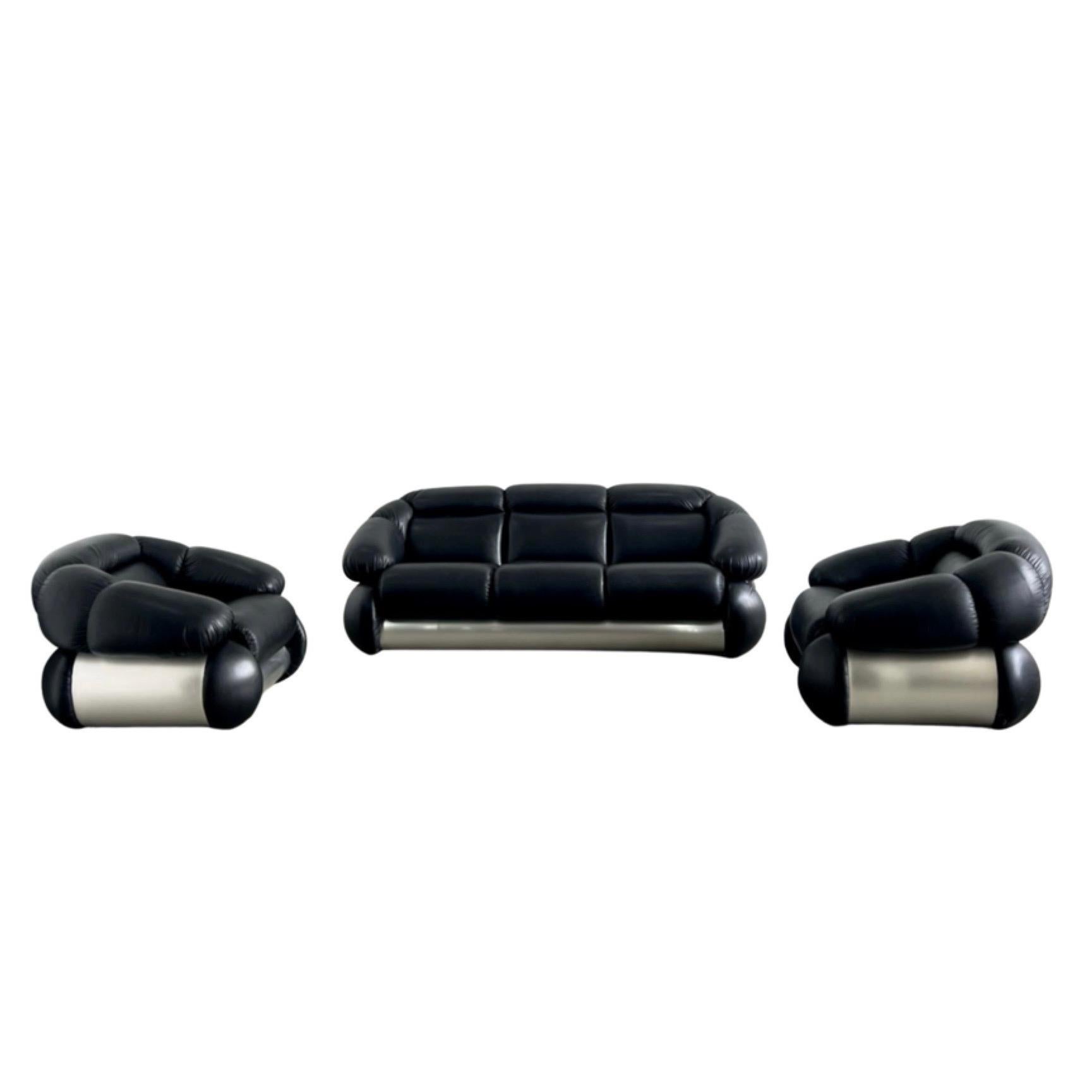 
This sofa and armchairs set is a Space Age design furniture realized by the Italian designer, painter and sculptor Adriano Piazzesi in the 1970s.

Including a three-seat sofa and two armchairs realized using metal, wood and Black