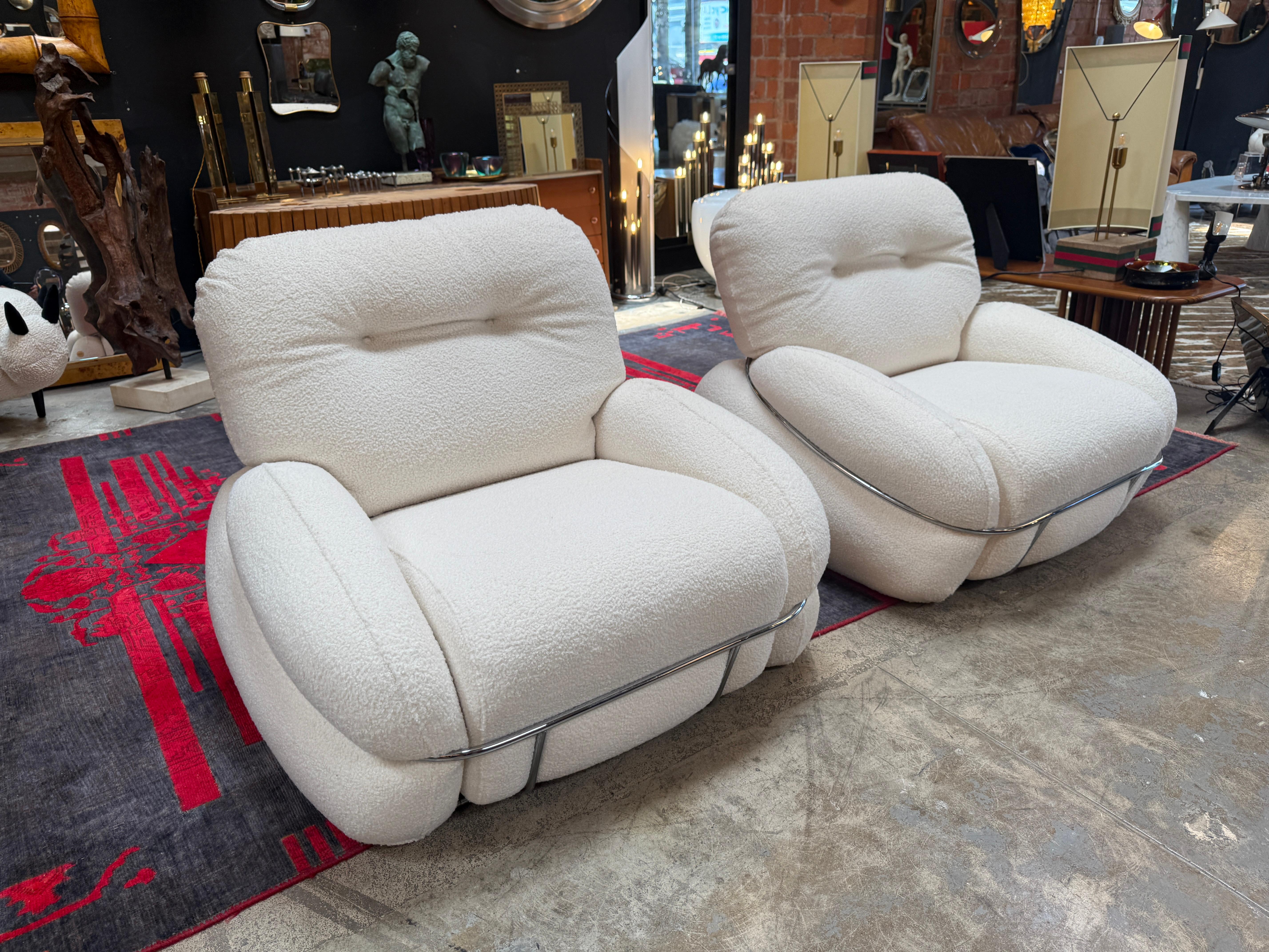 This pair of lounge chairs by Adriano Piazzesi captures the bold comfort and sculptural energy of 1970s Italian design. Recently reupholstered in a richly textured white bouclé, each chair features a cloud-like silhouette with generously padded