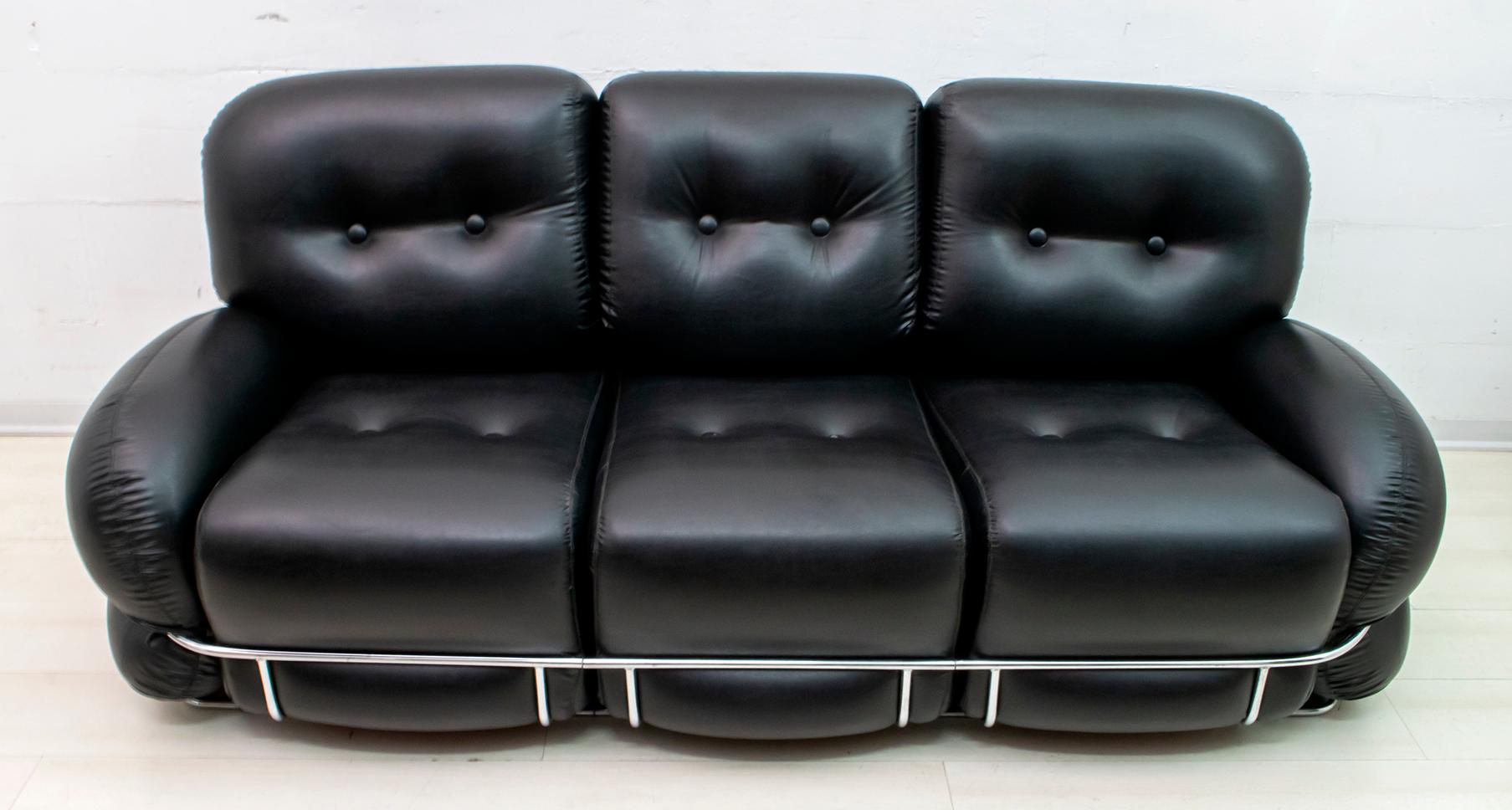 Designed by the designer, painter and sculptor, Adriano Piazzesi (1923 - 2009), this soft black leather sofa with a chromed tubular steel structure in which the soft foam cushions are inserted, as light as inflatable, as he would like to imitate.