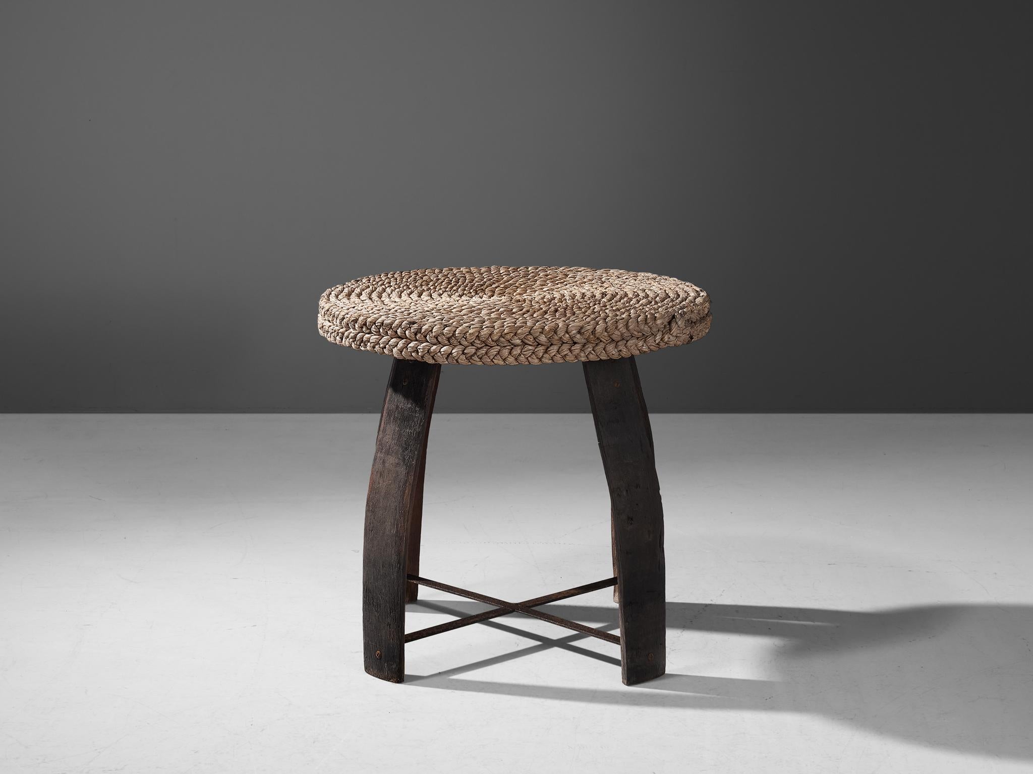 Adrien Audoux and Frida Minet, table, oak, straw, France, 1950s

This rare table was created by the French designer couple Adrien Audoux and Frida Minet. The legs of the table are made of dark oak. The wood was originally used for wine barrels.