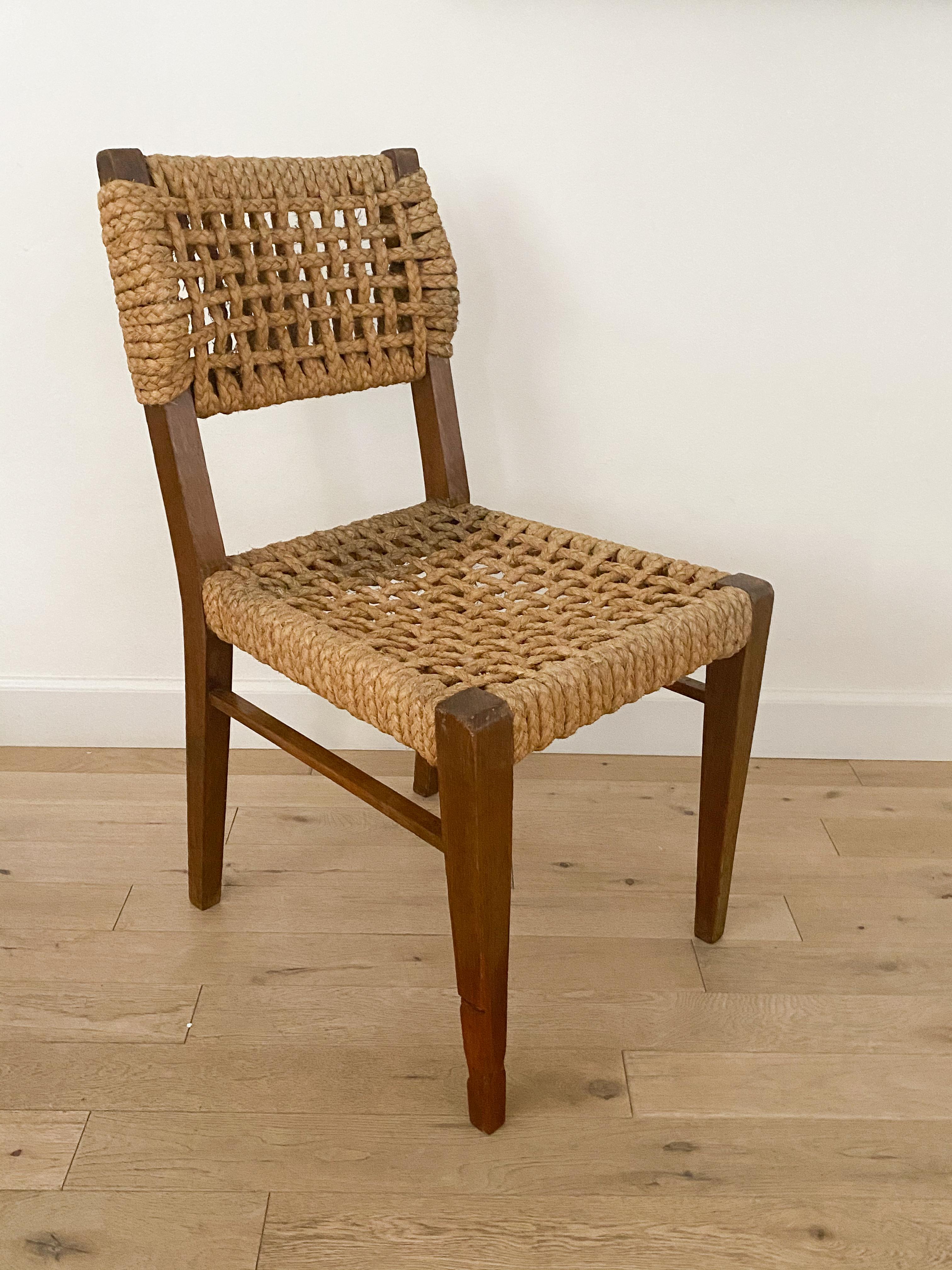 Vintage Adrien Audoux & Frida Minet chair from France, 1950s. All original wood and rope seat with nice patina and age. Beautiful statement chair showcasing a Classic design. Three available, sold individually. 