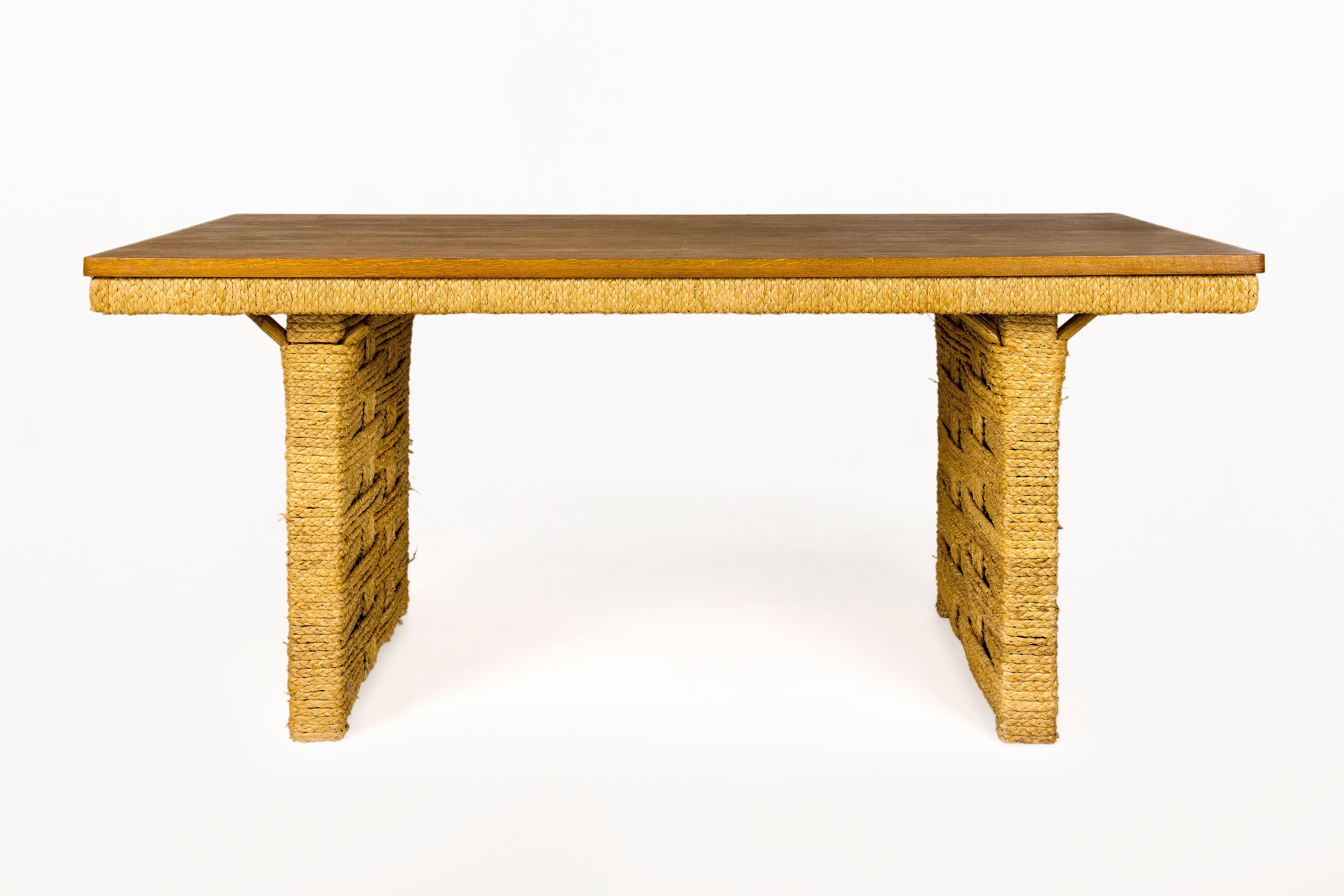 Adrien Audoux & Frida Minet Dining Table.
Rope detailing.
Oak top,
circa 1955, France.
Very good vintage condition.
Adrien Audoux and Frida Minet were a French couple and worked as designer.
During the 1940s and the 1950s, they designed