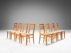 Adrien Audoux & Frida Minet Juego de ocho sillas de comedor de cáñamo trenzado