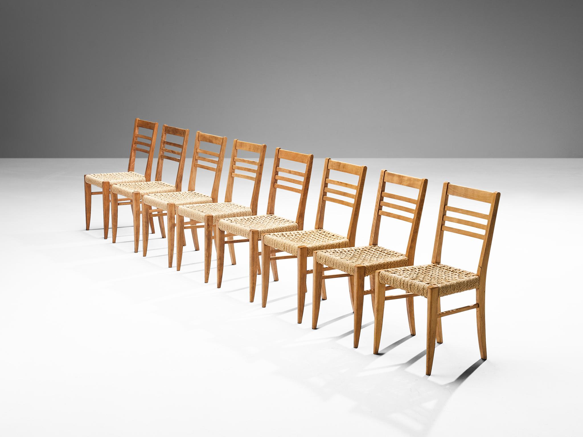 Adrien Audoux and Frida Minet for Vibo, set of eight armchairs, beech, rope hemp, France, late 1940s 

Set of eight naturalistic dining chairs designed by Adrien Audoux and Frida Minet. The seats are made of woven hemp from the abaca plant which is