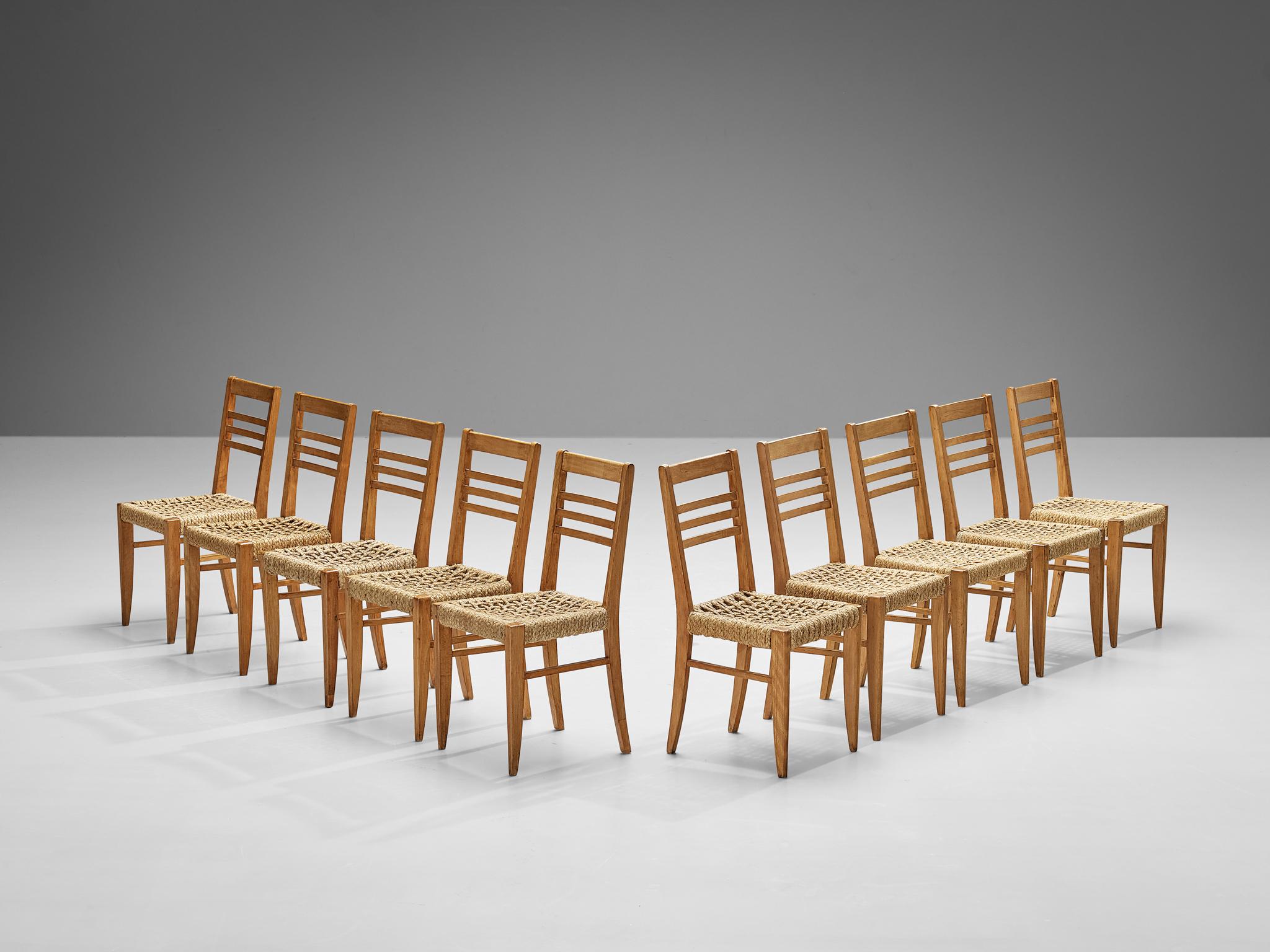 Adrien Audoux et Frida Minet pour Vibo, ensemble de dix fauteuils, hêtre, corde de chanvre, France, fin des années 1940. 

Ensemble de dix chaises de salle à manger naturalistes conçues par Adrien Audoux et Frida Minet. Les sièges sont en chanvre