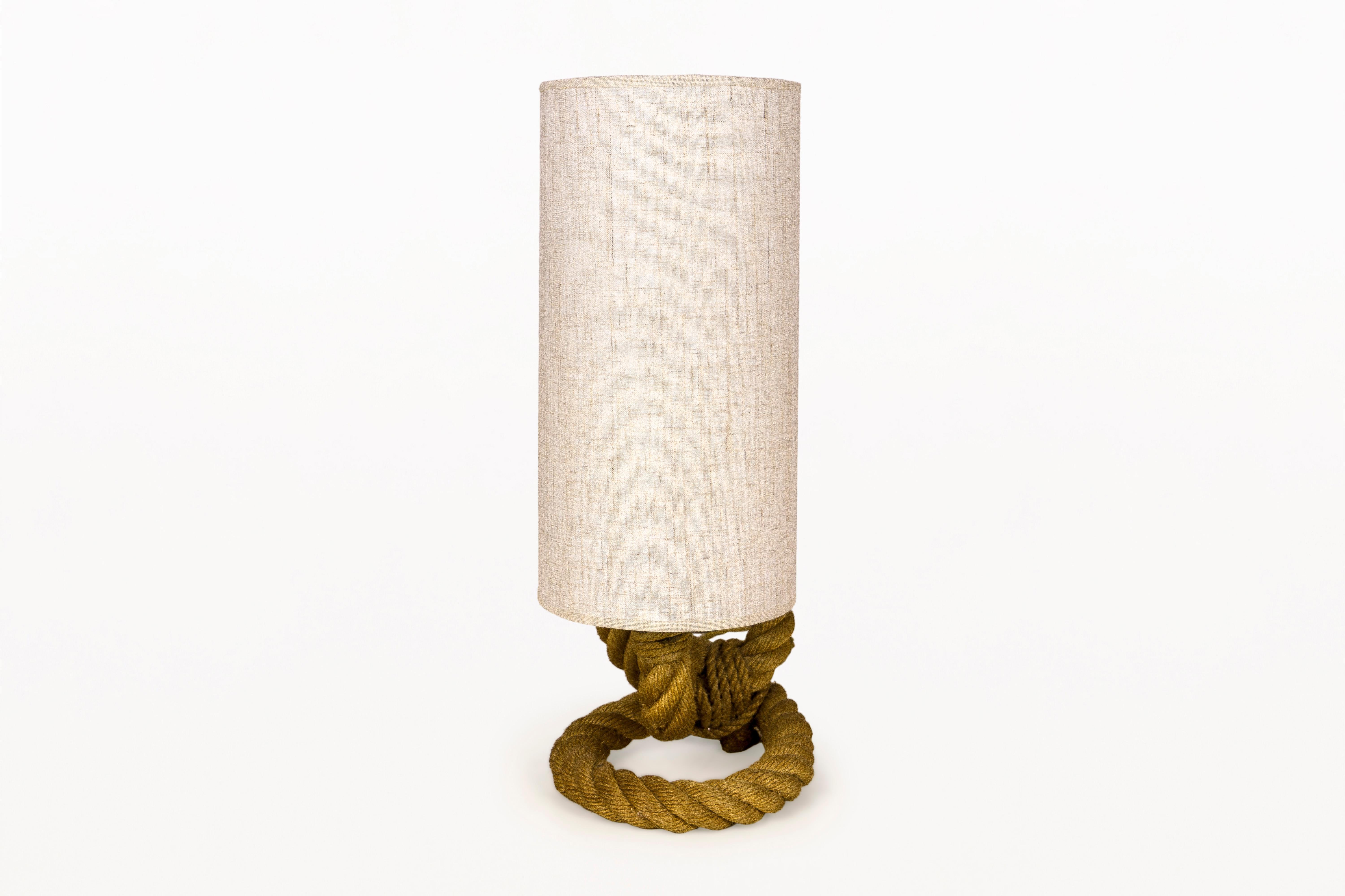 Adrien Audoux and Frida Minet table lamp.
Base made with rope.
Functional and stylish,
circa 1950, France.
Very good vintage condition.
Adrien Audoux and Frida Minet were a French couple and worked as designer. During the 1940s and the 1950s,