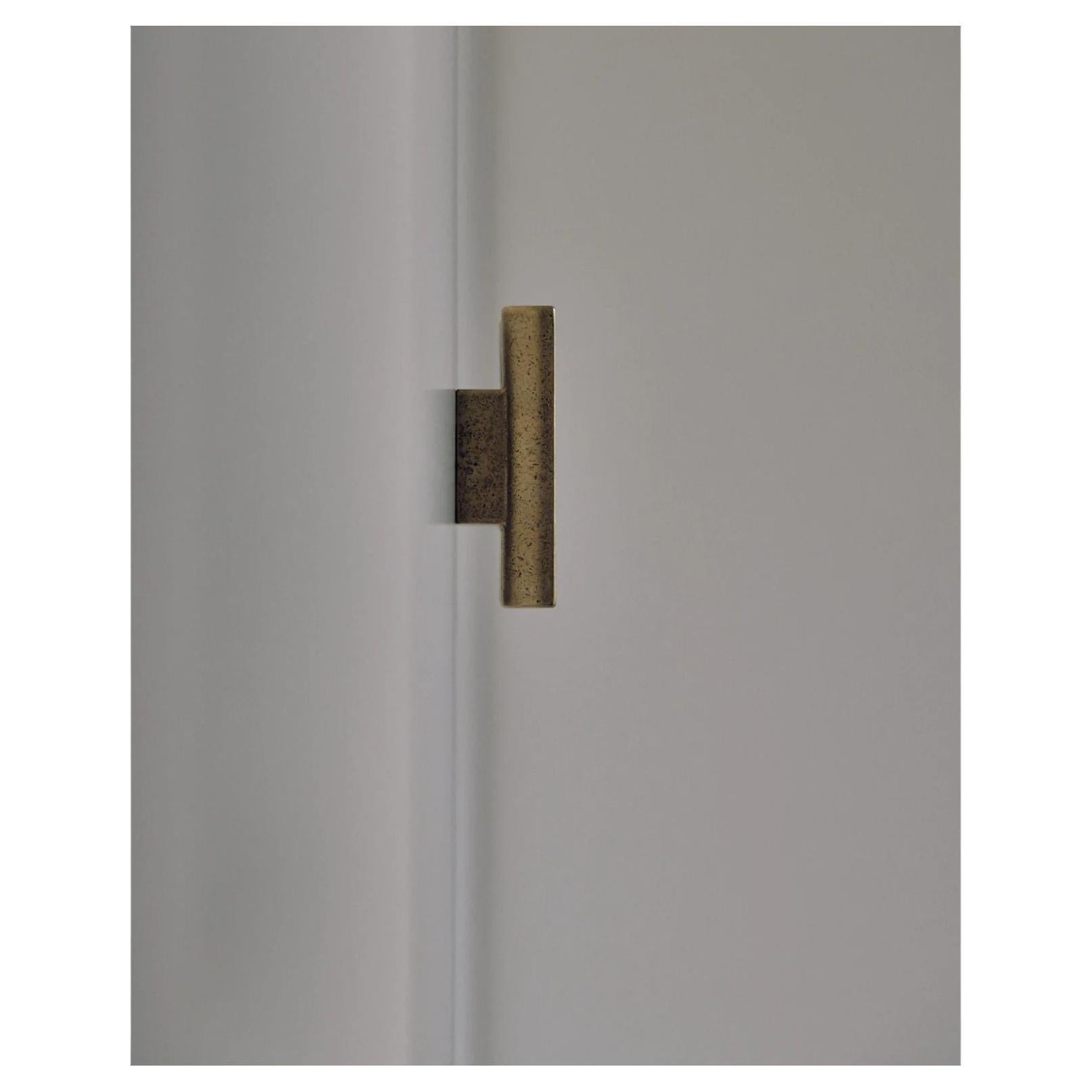 ADT Handle Brass by Henry Wilson
Dimensions: D 3 x W 9 x H 1.8 cm
Materials: Brass

This versatile handle can be used for cabinetry, sliding doors and sash windows. Can be specified threaded or face fixed. Face fix lead time 4 weeks.
Each piece