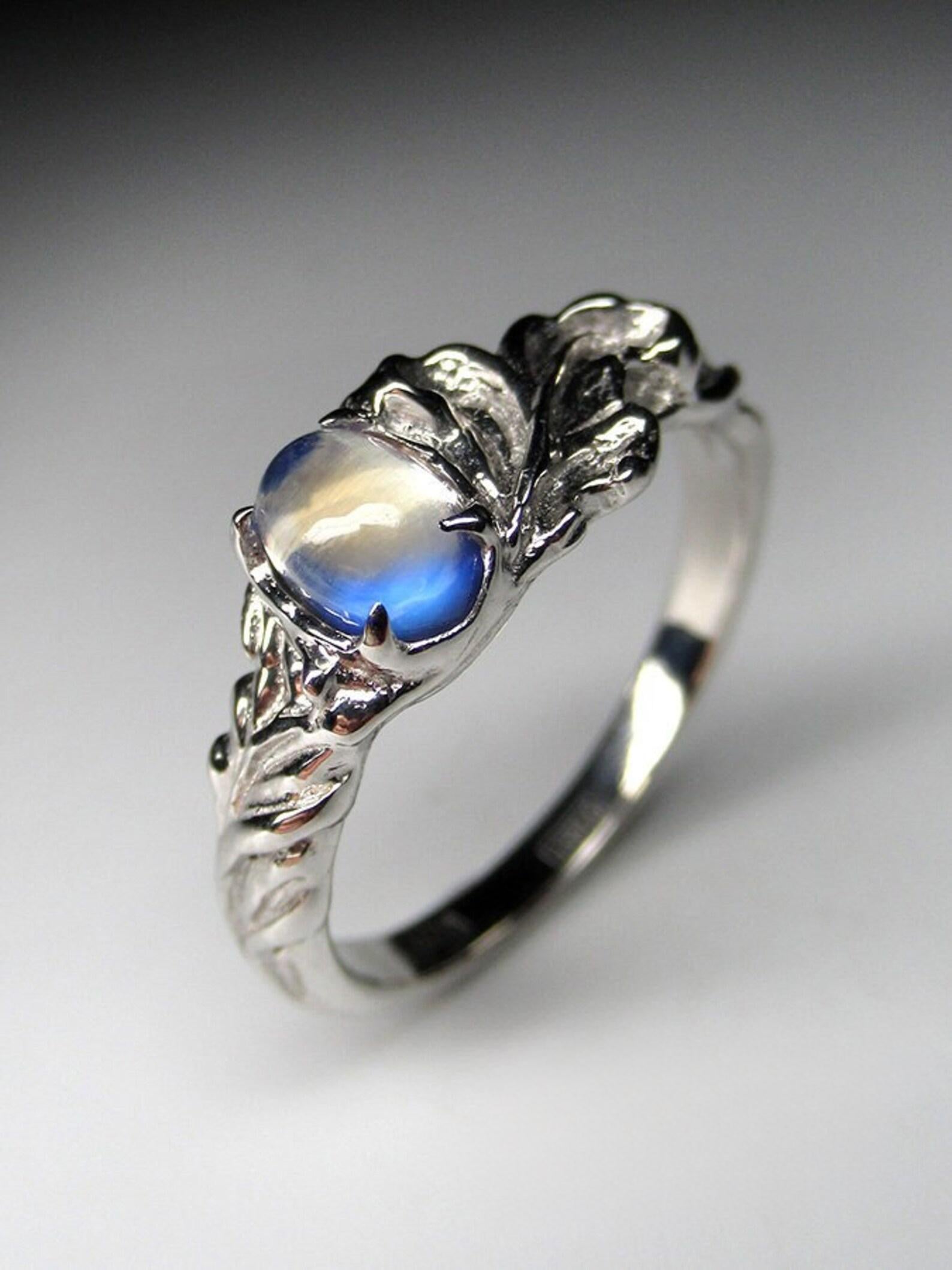 Rhodium-plated silver ring with natural fine quality Adularia Moonstone
gemstone origin - Sri Lanka
moonstone measurements - 0.12 х 0.16 х 0.24 in / 3 х 4 х 6 mm
moonstone weight - 0.6 carats
ring weight - 1.96 grams
ring size - 6.5 US 