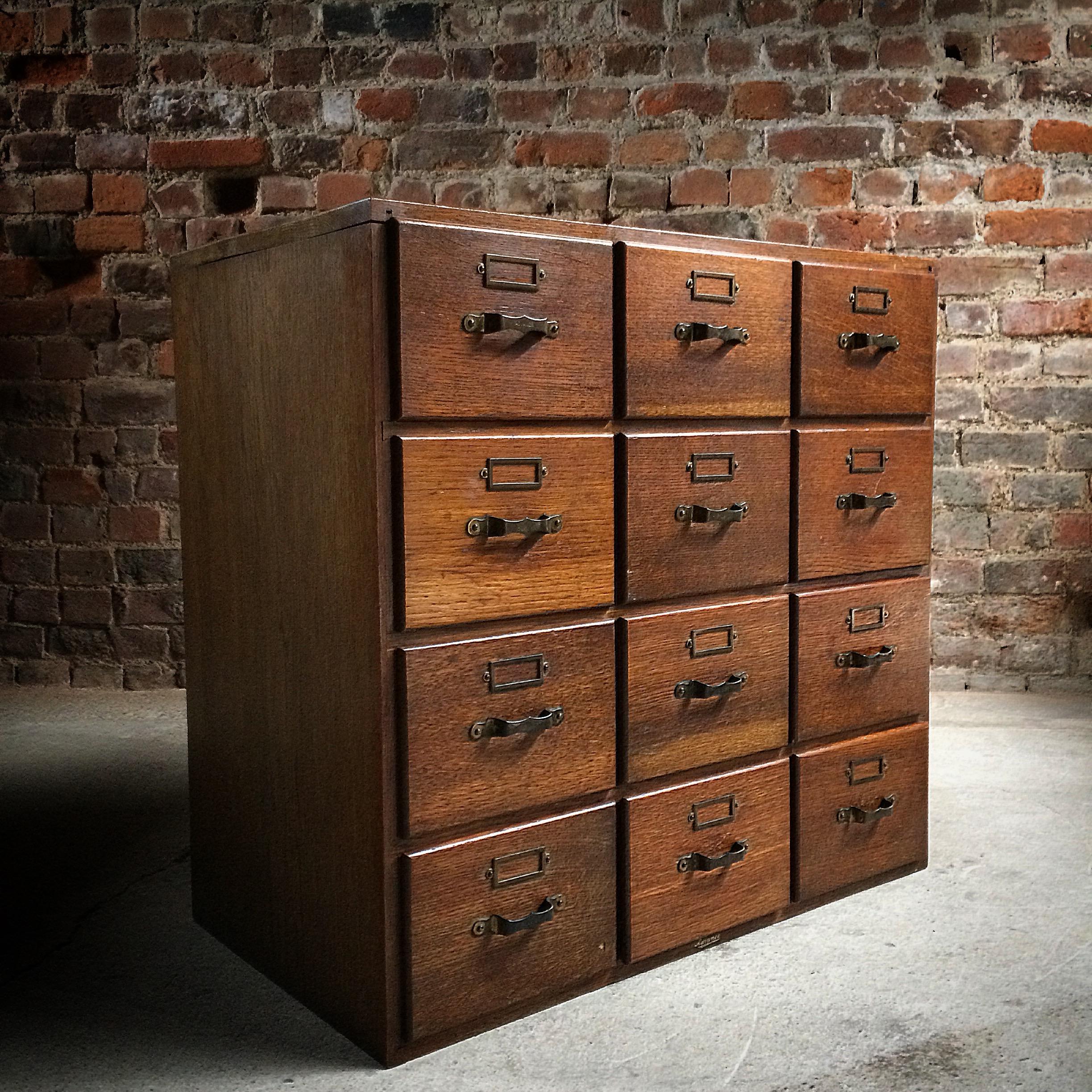 Advance systems oak filing cabinet circa 1900s, the rectangular top over twelve numbered drawers all with brass pull handles and index card holders, solid oak, she’s a beauty.

PS: If one wanted to make this even nicer, you could easily attach