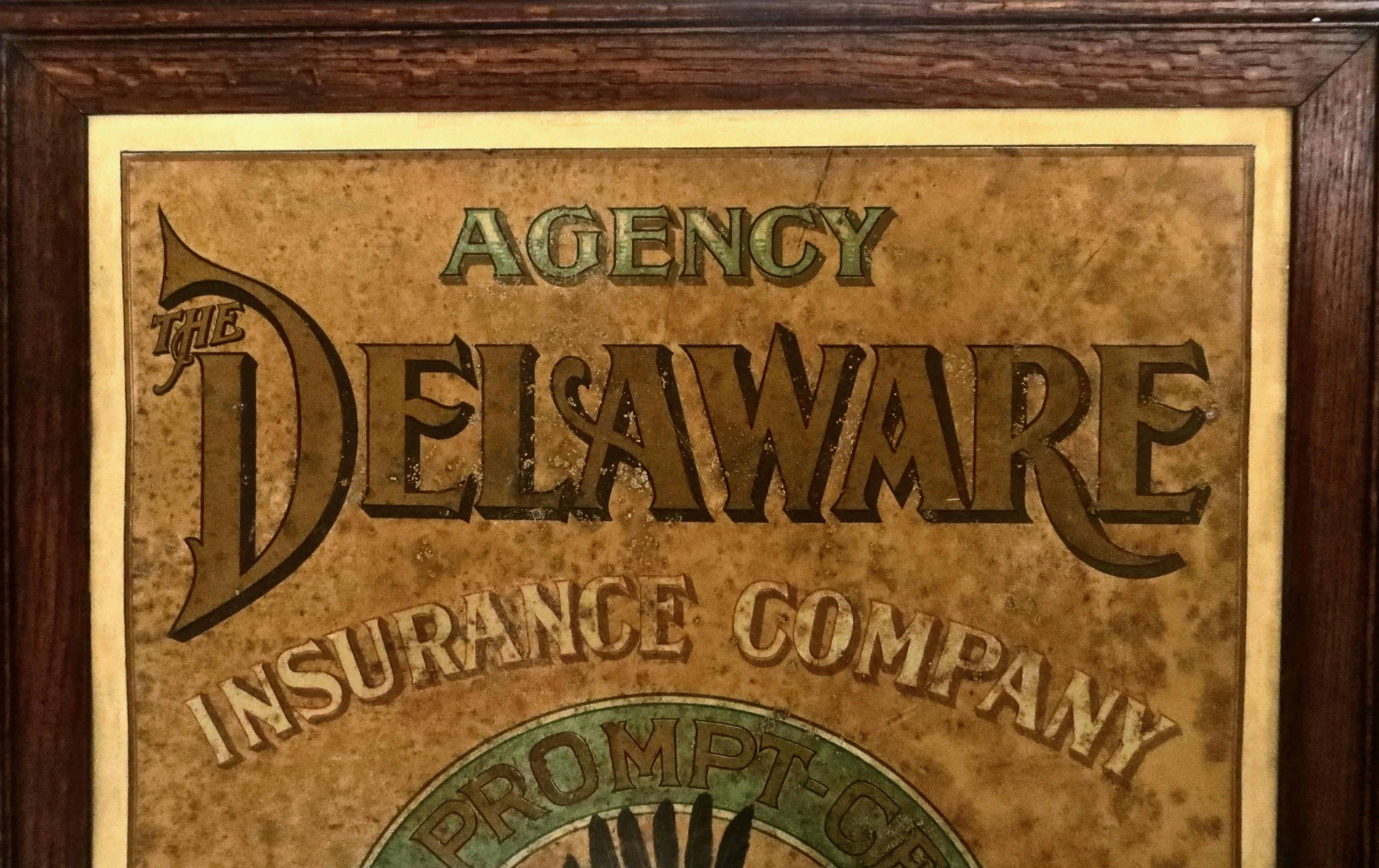 This is a very rare and early (circa 1885) tin advertising sign, commissioned by the Delaware Insurance Company, located and founded in Philadelphia in 1835. It was probably made by noted late 19th century sign maker, Sentenne & Green, of New York