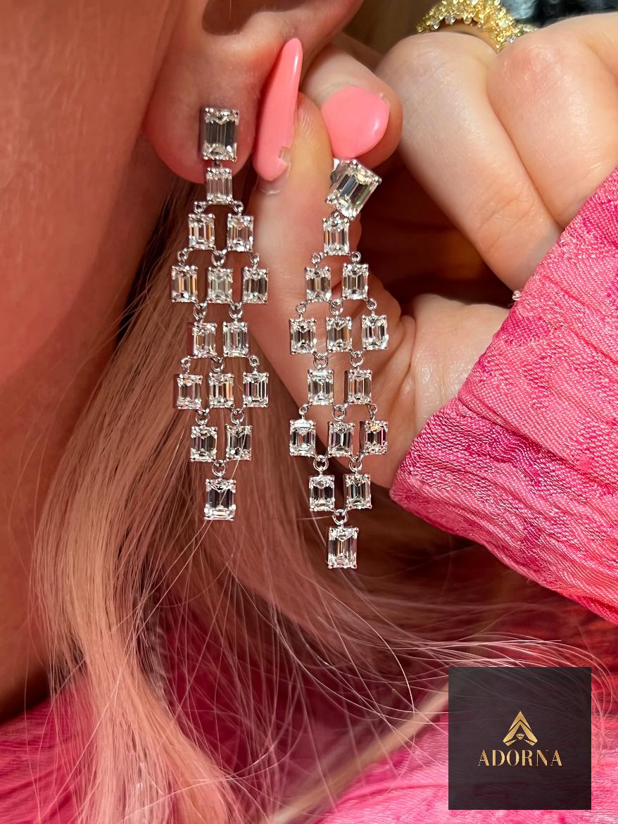 Geometric Cascade 18K White Gold Long Dangling Earrings. Featuring 30 dazzling natural diamonds with a brilliant VS/G clarity, these earrings are crafted to perfection for those who seek luxury and sophistication. Perfect for special occasions or as