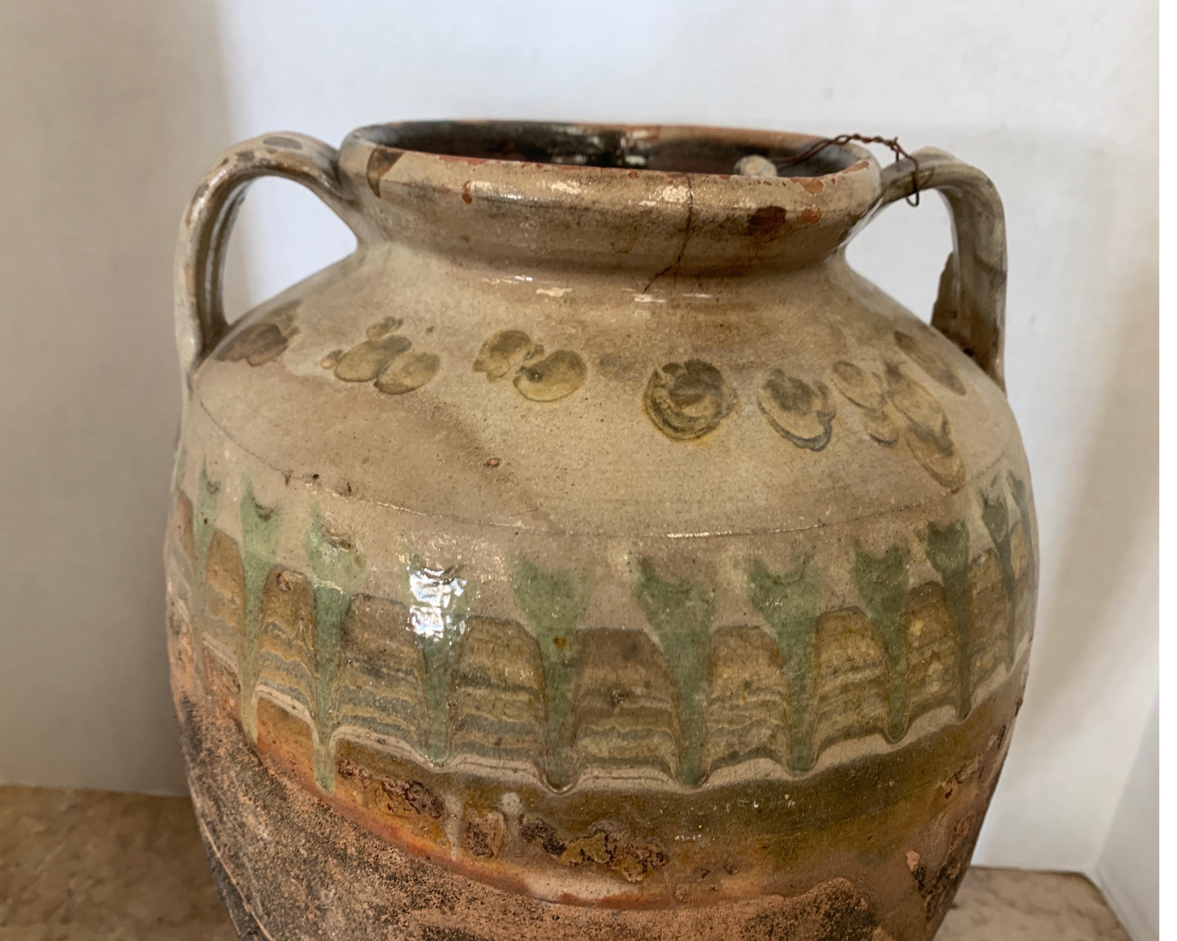 This early Turkish jar has the prettiest hue of greens. It’s a nice size at 10” wide x 9 3/4 depth x 15 tall.