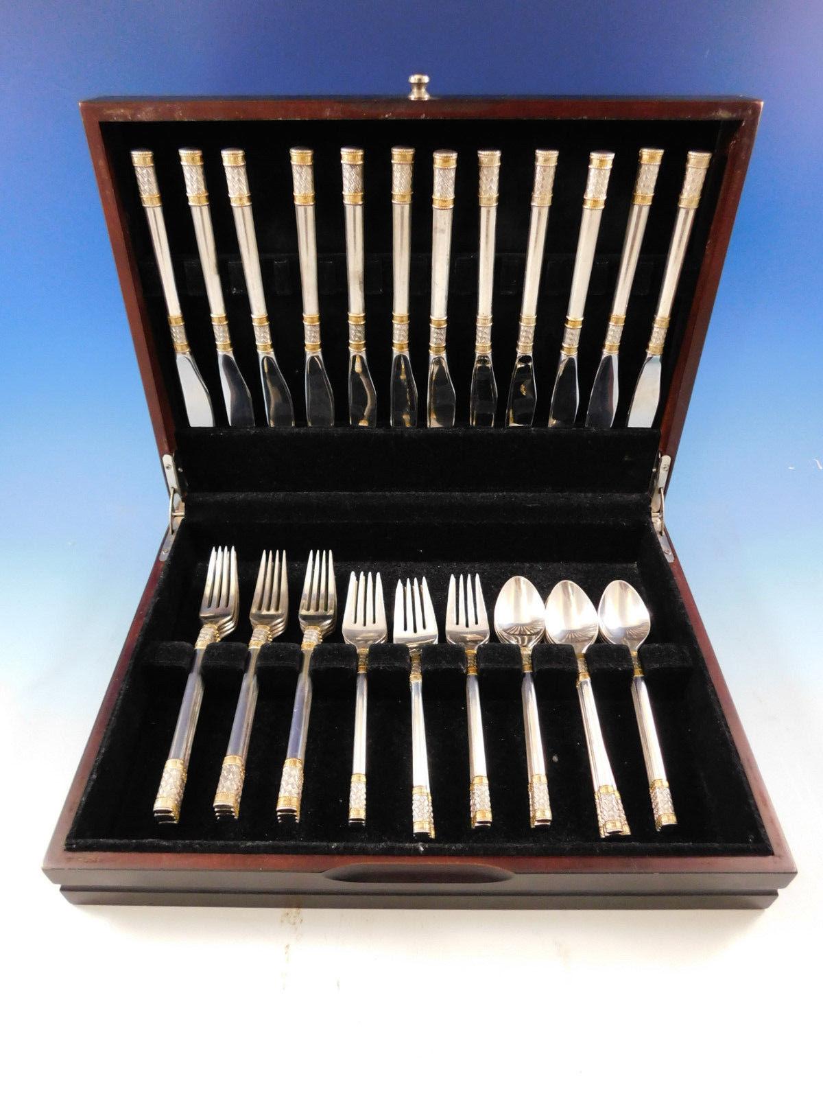 Aegean weave gold accent by Wallace sterling silver flatware set, 48 pieces. This set includes:

12 knives, 9 3/8