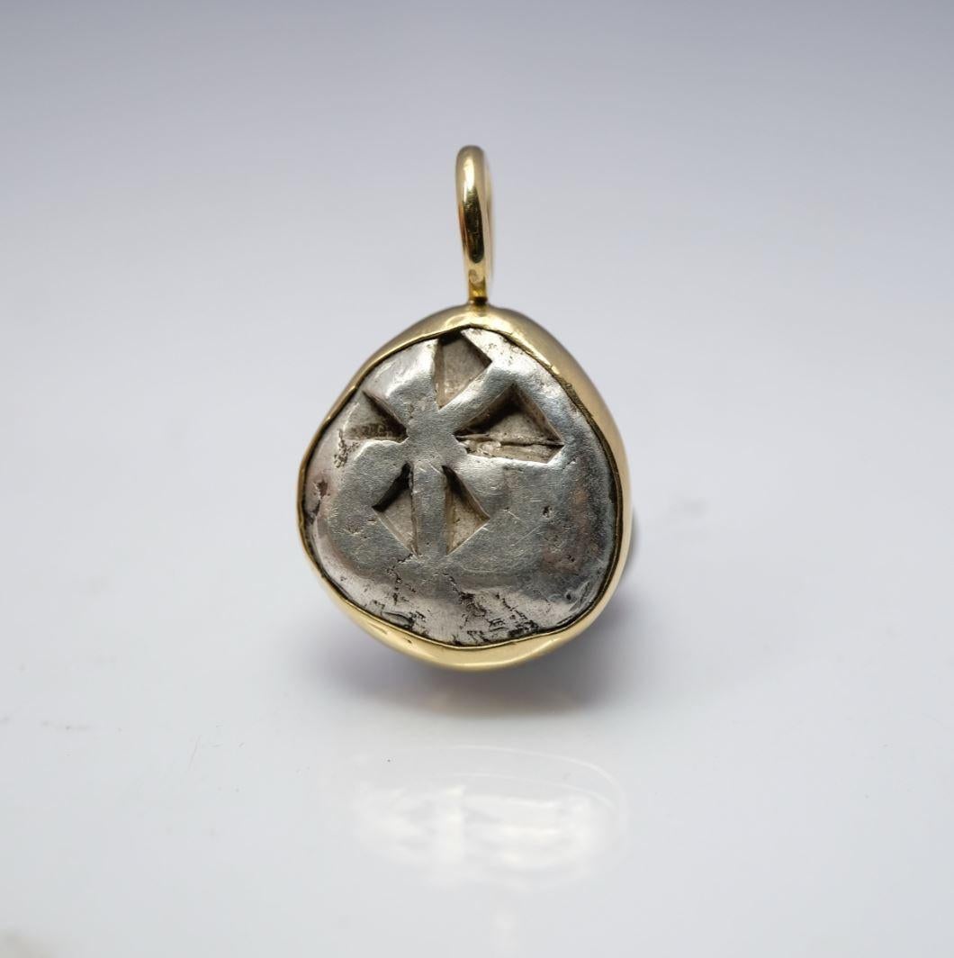 I've wanted to buy this ancient coins for about a decade and I finally did. It's a stunning, thick 12.15 grams silver coin from 500 BC showing a turtle and incuse pattern on the back. 

To appreciate its size, the relief of the coin and the shape of