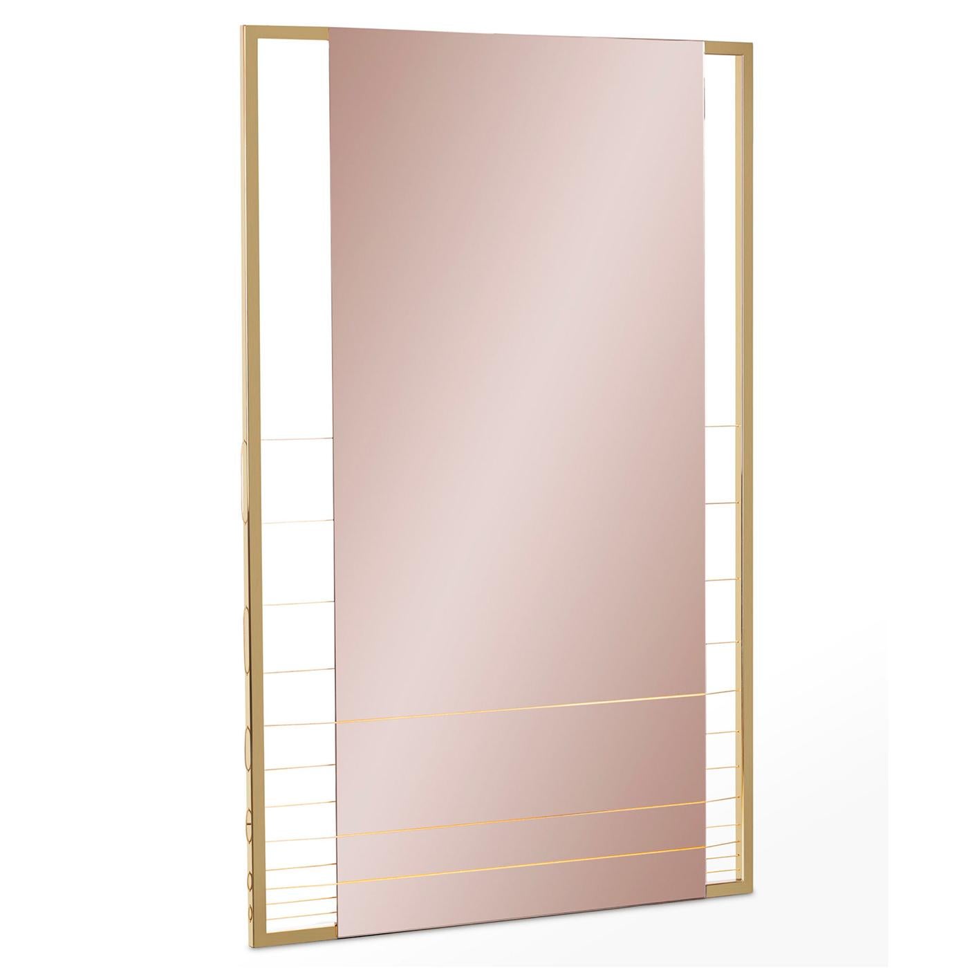 Entirely assembled and finished by hand, this remarkable wall-mounted mirror designed by Ziad Alonaizy is inspired by the IDEA of protection of the Greek mythology's aegis. The pink-tinted mirror is seemingly suspended inside a stainless steel frame