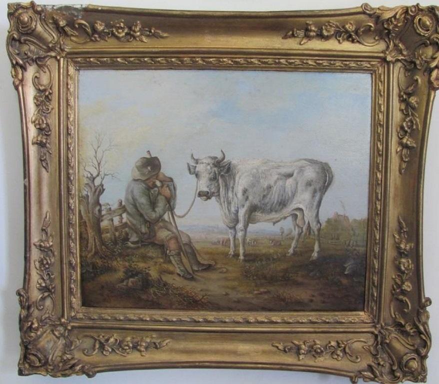 After Aelbert Cuyp (unsigned) an oil on board country scene depicting a farmer and bull. The painting is in  overall very good condition  however the frame has some losses .Mainly to the top left hand side ,see photo . 
The size being 18½ x 15