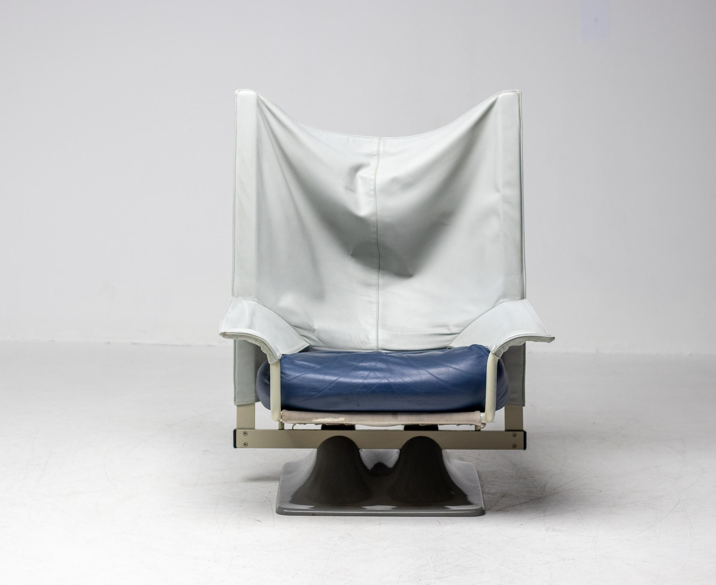 Pair of 'Aeo' chairs designed by Paolo Deganello for Cassina. Light gray leather back and arms and a blue leather seat cushion. Very comfortable Model AEO lounge chair by Paolo Deganello designed in 1973. 
This is a version with armrest and is no