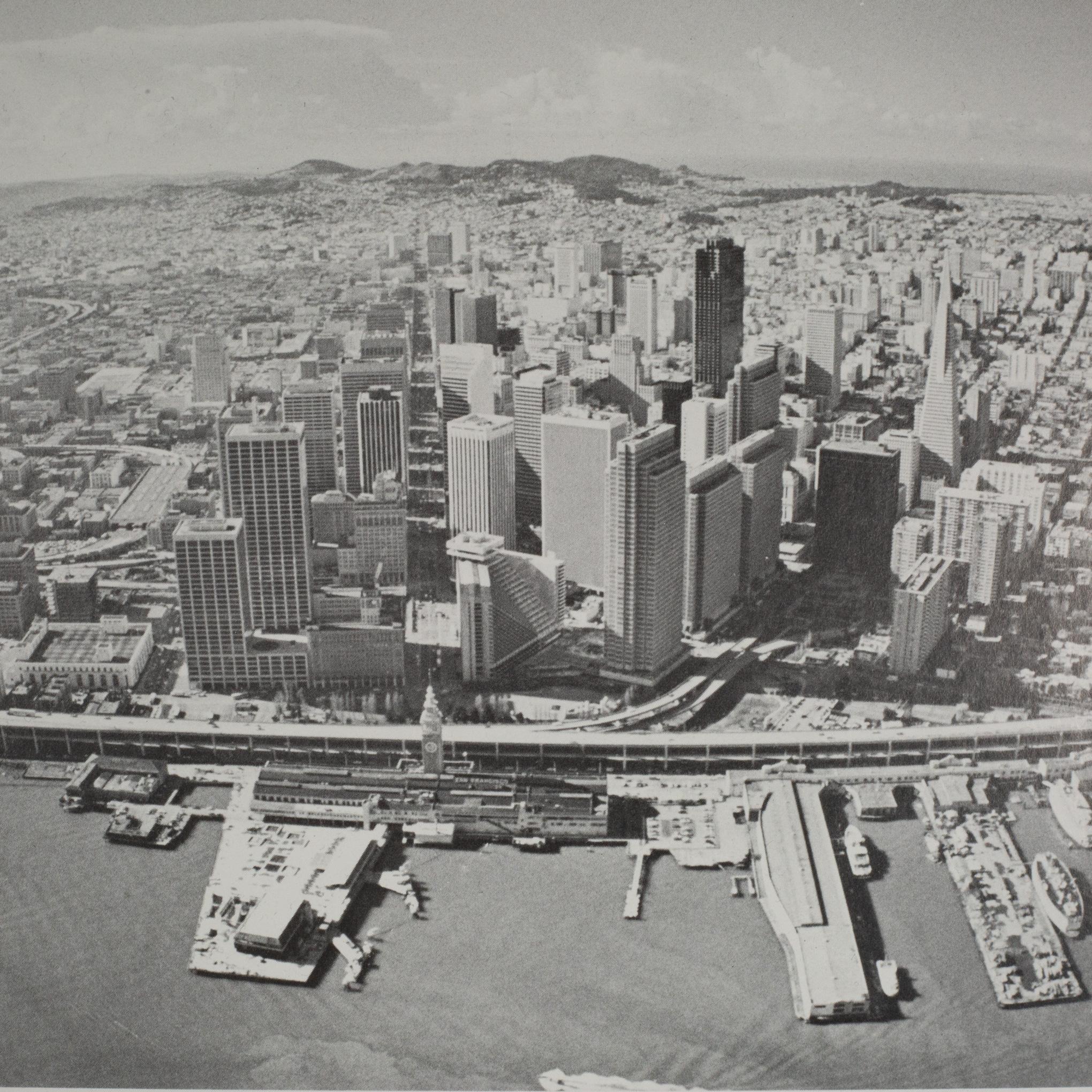 ABOUT

Comparison aerial photographs of San Francisco printed on glossy fine art paper. The first image is an aerial shot of the city taken in 1981 by an unknown photographer. It depicts the harbor and downtown all the way out to Ocean Beach and the