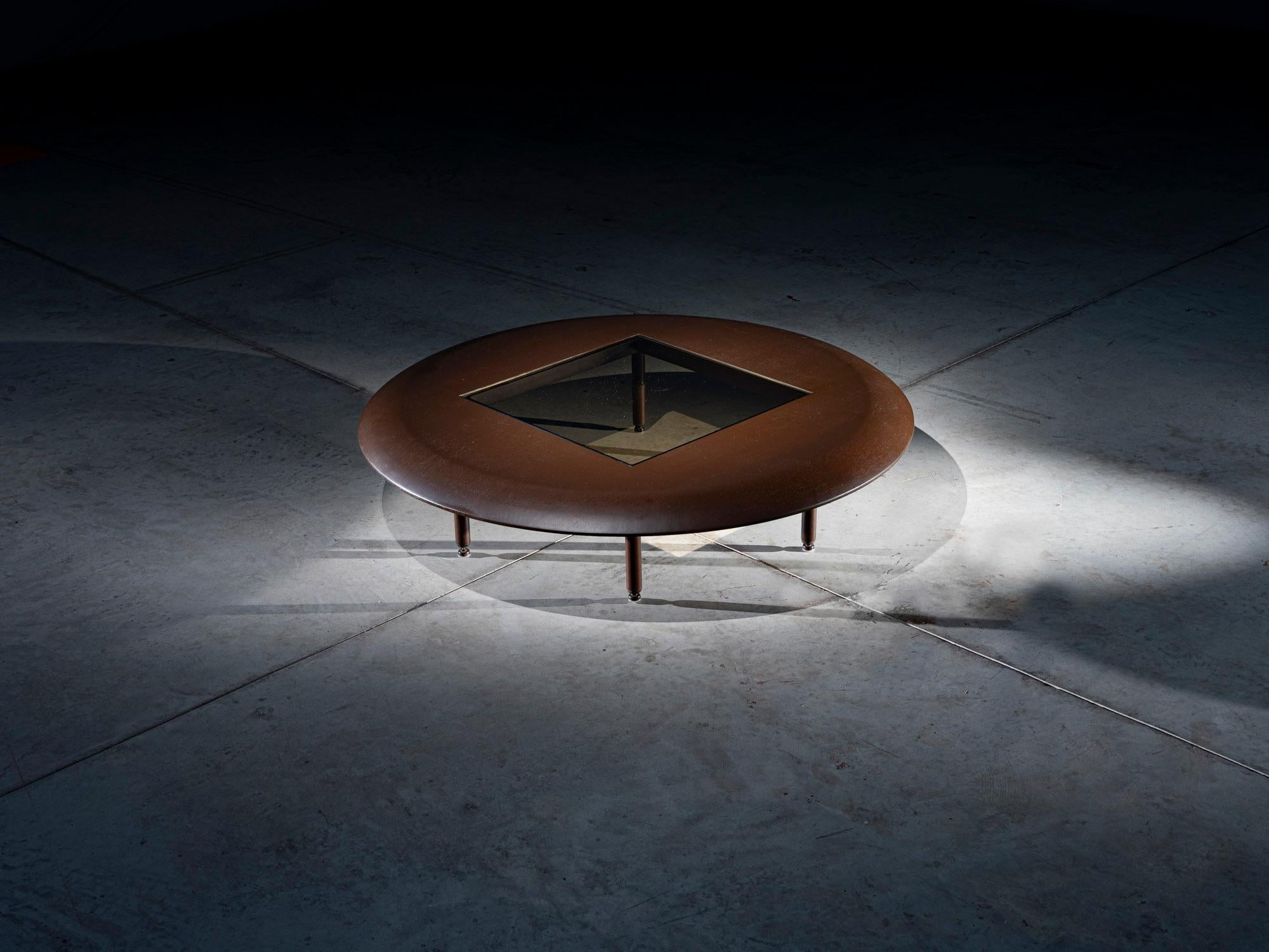 Aero Round Coffee Table by Giacomo Tomazzi Studio
Dimensions: W 120 x D 120 x H 23 cm
Materials: MDF with natural wood laminate, painted carbon steel structure, 10mm bronze glass elements, Brass handles, drawers with stitched natural leather
