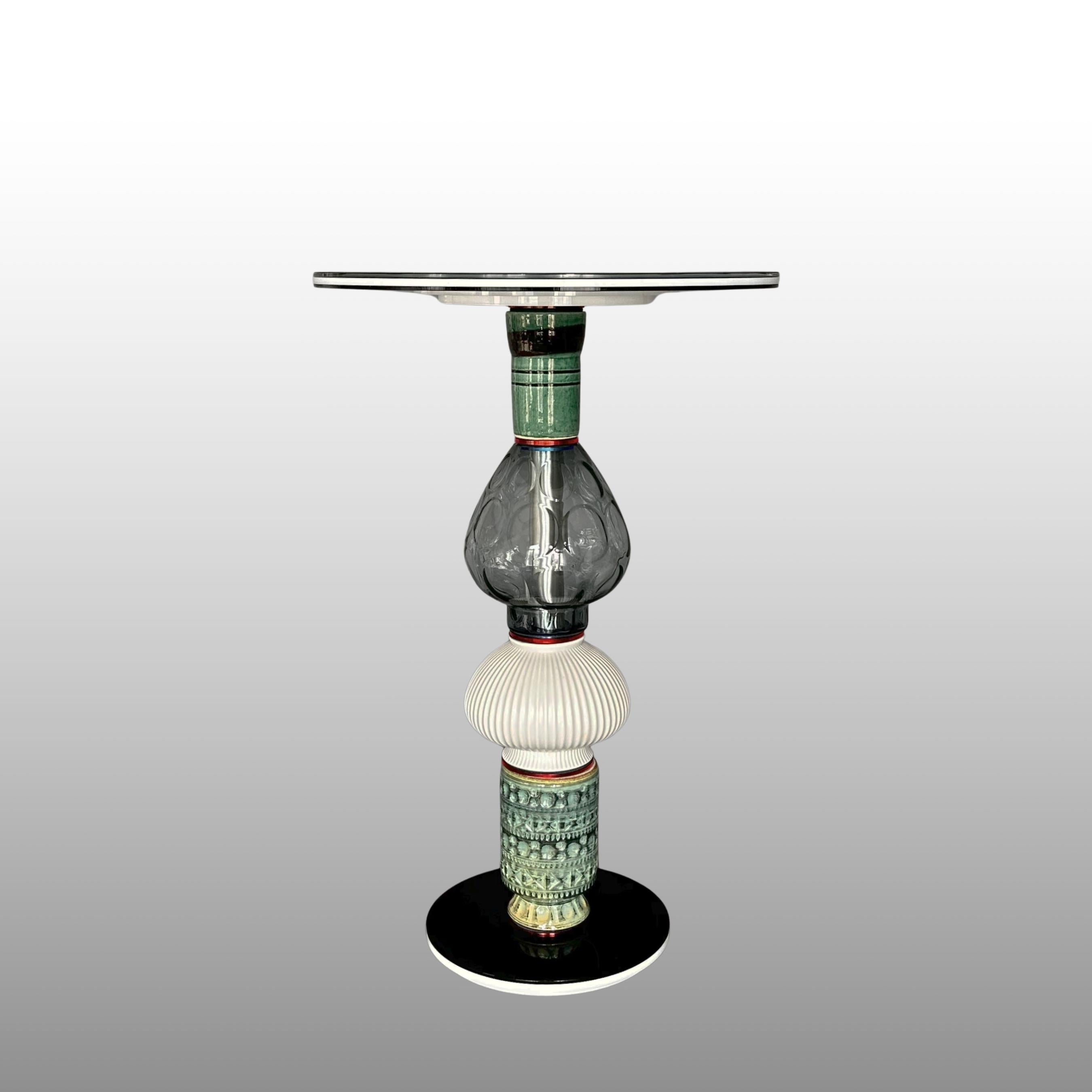 Designer and Artist Andreas Berlin created a collection of extraordinary side tables. This tables are sculptures and high end useful upcycling tables. The vases found in antiquarian stores become a new life as a segment of a sculpture. A clever