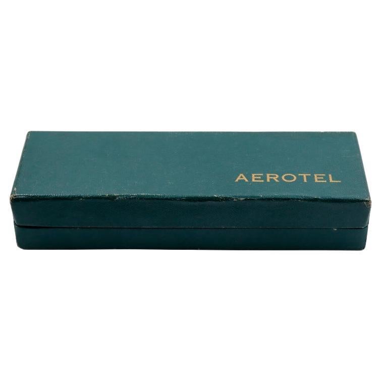 FACTORY / HOUSE: Aerotel Watch Company / by Breitling 
STYLE / REFERENCE: Art Deco / Chronograph
METAL / MATERIAL: 18kt Rose Gold
CIRCA / YEAR: 1940's
DIMENSIONS / SIZE: Length 42mm X Diameter 35mm
MOVEMENT / CALIBER: Manual Winding / 17 Jewels /