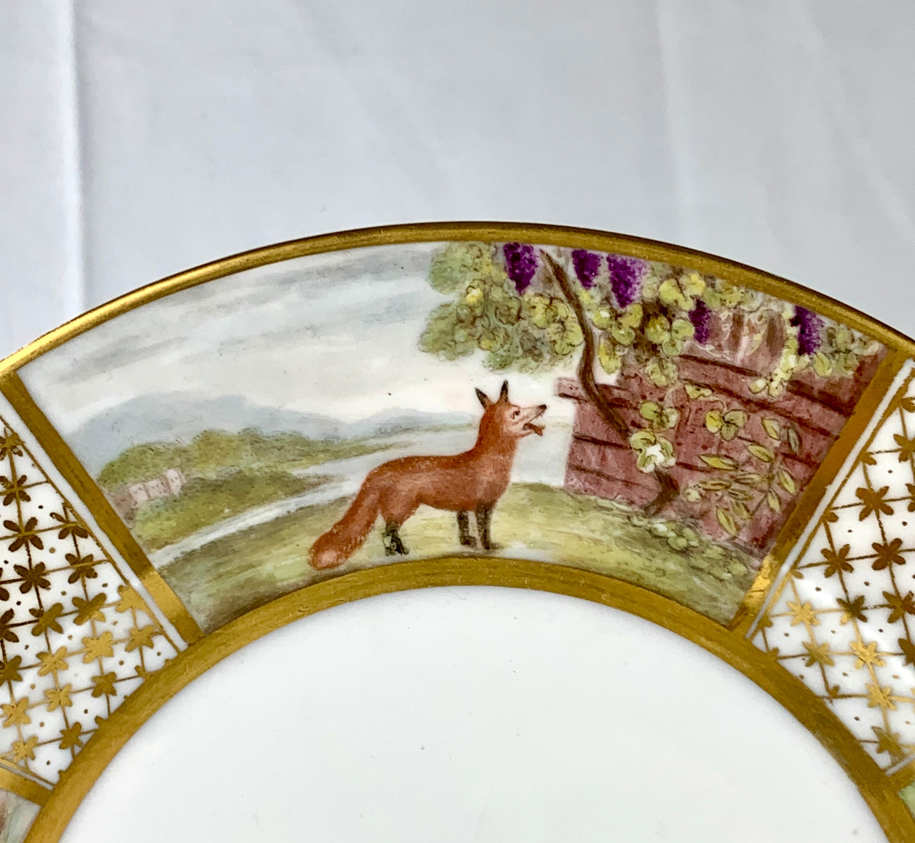 Four beautiful scenes from Aesop's fables adorn this marvelous plate.
It was made in France circa 1825.
Each scene captures the essence of the fable it depicts, transporting the viewer into the world of these timeless stories.
1) The Fox & the