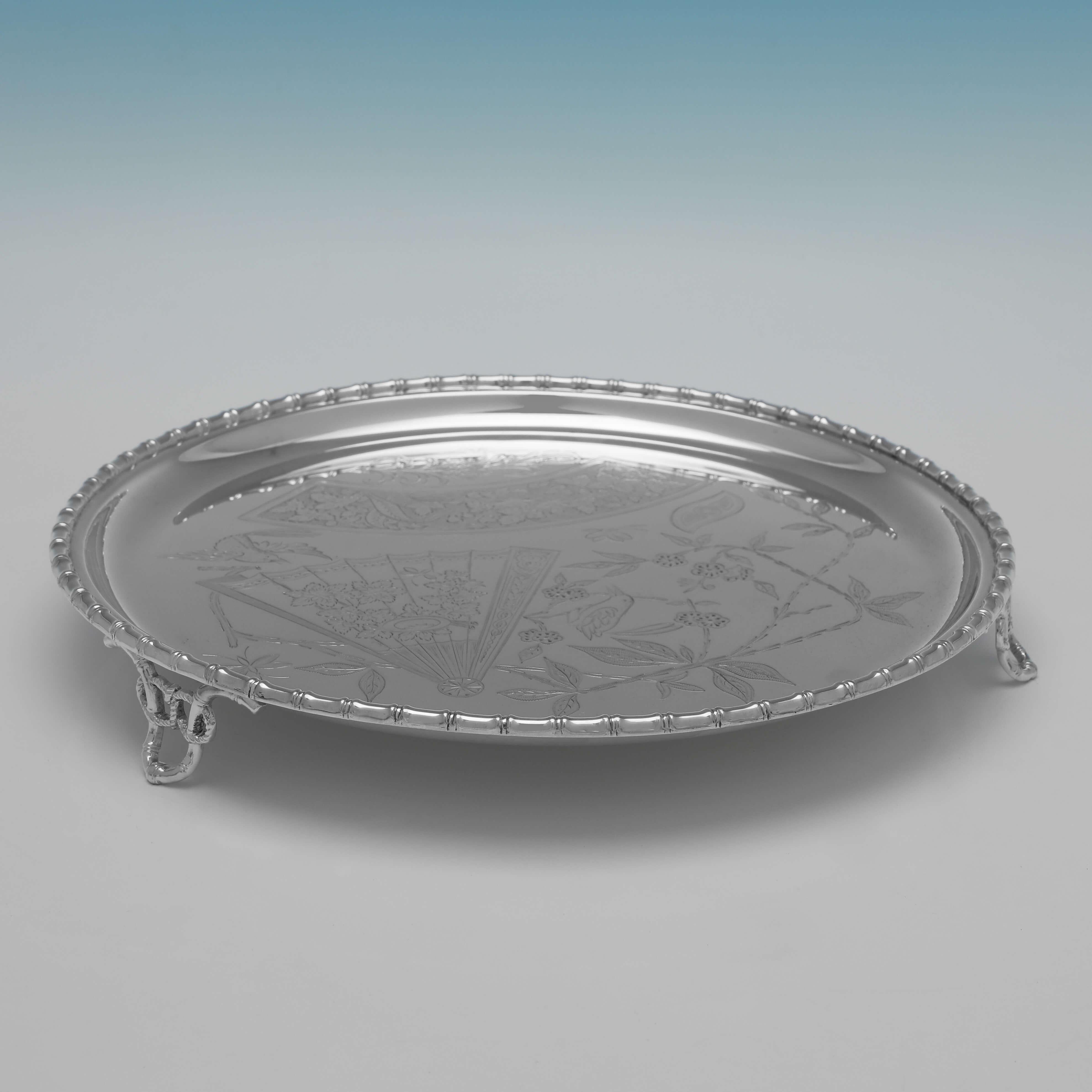 Made circa 1870 by Atkin Brothers, this very attractive, Antique Silver Plate Salver, is a wonderful example of Aesthetic design, featuring a bamboo edge and Japanese inspired engraving to the centre. The salver measures 1.25