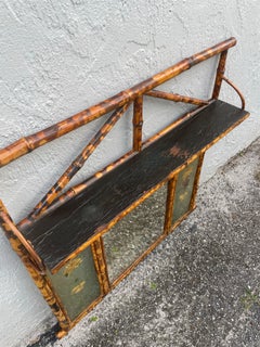 Specchio da parete in bambù dell'Aesthetic Movement con mensola, 1880 ca.