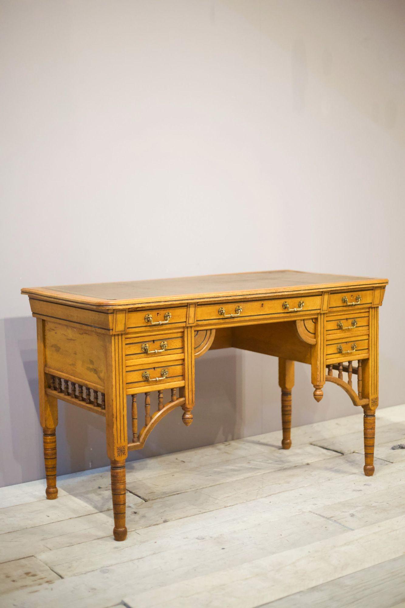 This is a very stylish piece of Aesthetic movement funriutre by renowned makers Maple and co. The whole design is wondeful with tall legs and almost Moorish influence. The drawers all run smooth and retain the original detailed handles. The whole